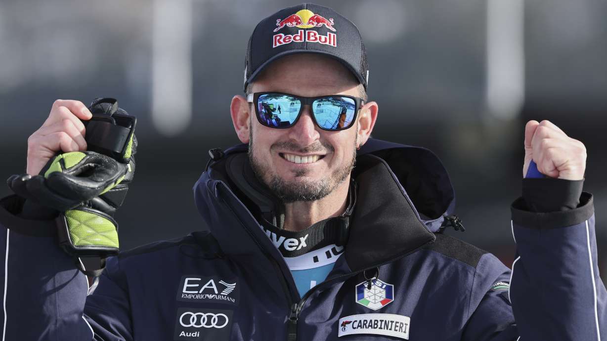 Italy's Dominik Paris celebrates at the finish area of an alpine ski, men's World Cup downhill, in Kvitfjell, Norway, Friday, March 7, 2025.