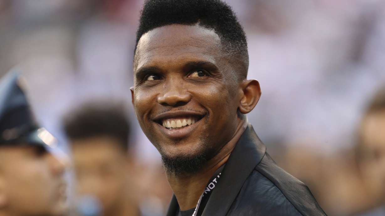 FILE - Soccer player Samuel Eto'o watches warmups before an International Champions Cup soccer match between Atletico Madrid and Real Madrid, July 26, 2019, in East Rutherford, N.J.