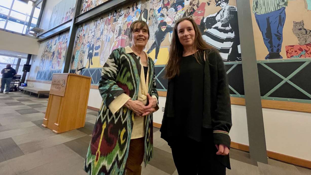 Artists Jann Haworth, left, and Liberty Blake at the unveiling of their collage, "Utah Women 2020 Mural," at Salt Lake Community College's South City Campus in Salt Lake City on Thursday.