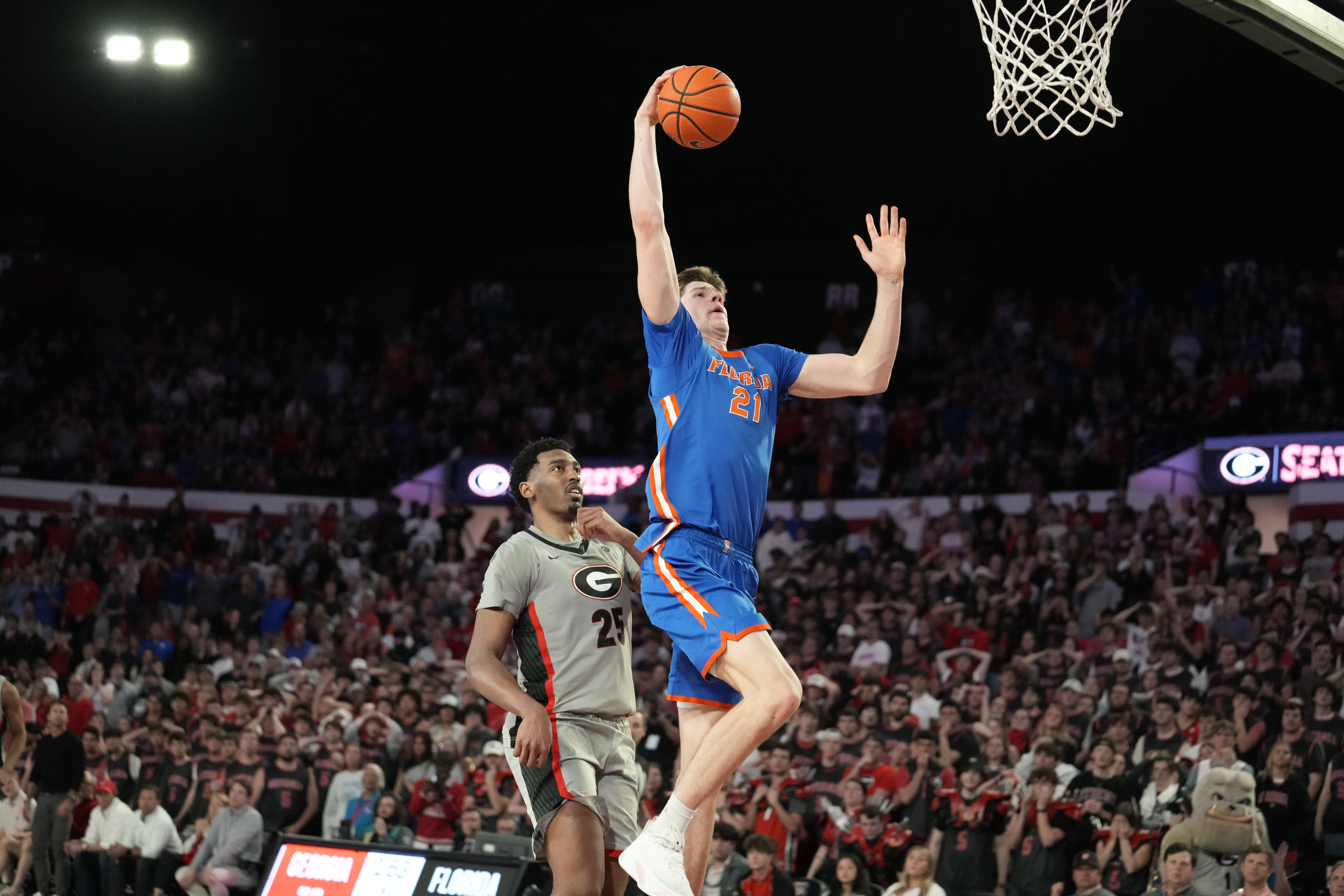 Florida forward Alex Condon (21) shoots and is fouled during an NCAA college basketball game against Georgia, Tuesday, Feb. 25, 2025, in Athens, Ga.