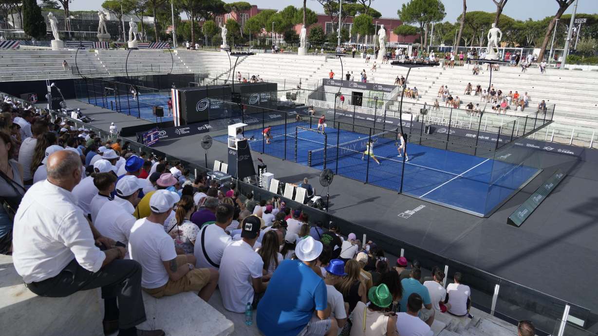 FILE - Spectators watch a match at the Italy Major Premier Padel tournament in Rome, Wednesday, July 12, 2023. A successful debut at the European Games with matches played before enthusiastic crowds in Krakow's central square last month. Record prize money of nearly $1 million at this week's tournament in Rome.