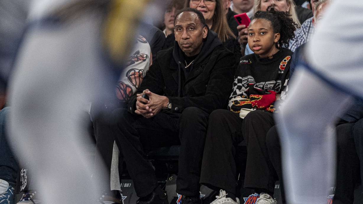FILE - Stephen A. Smith sits courtside during the first half of an NBA basketball game between the New York Knicks and the Golden State Warriors in New York, Thursday, Feb. 29, 2024.