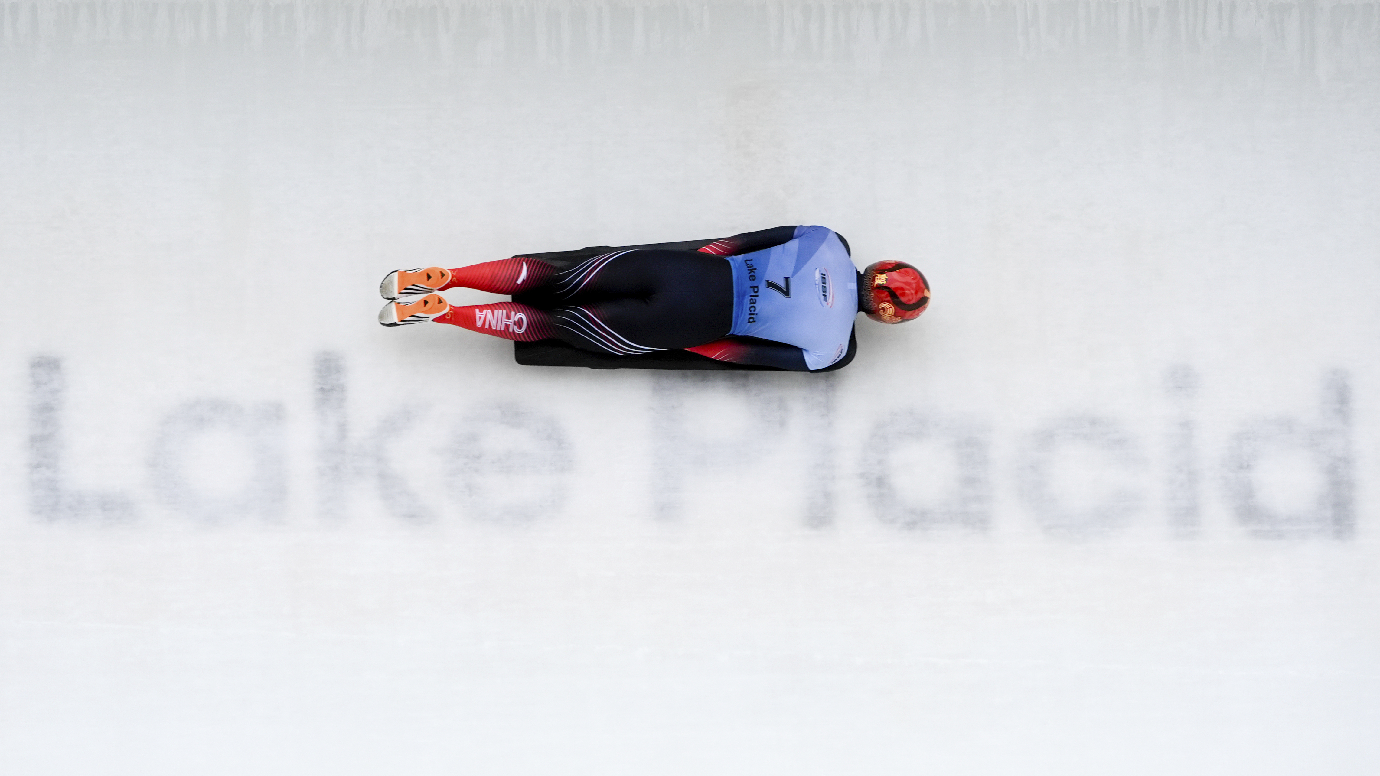 Zhen Yin, of China, slides during his second run at the skeleton world championships, Thursday, March 6, 2025, in Lake Placid, N.Y.
