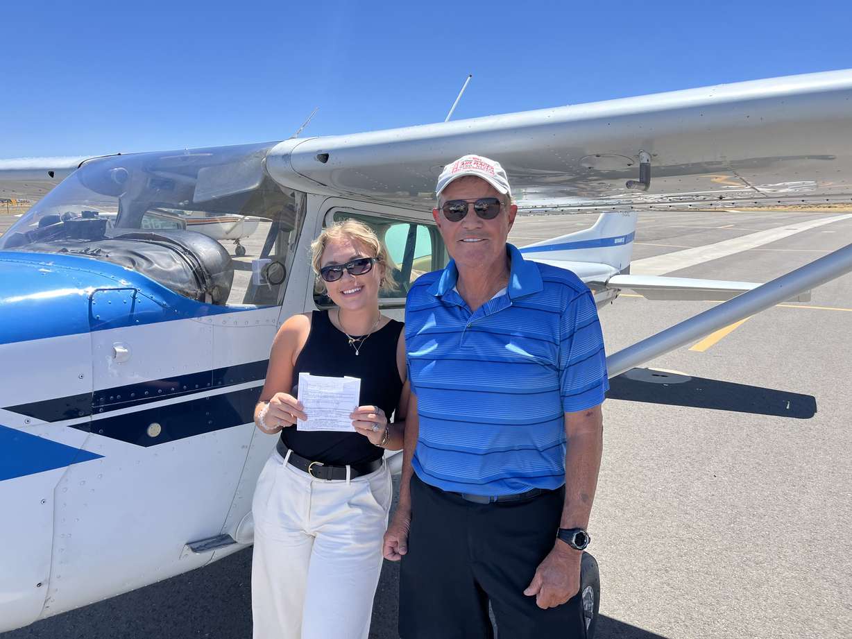 Cambrie Foster, 19, and mentor/flight instructor Stan Gibson. Foster has earned several pilot licenses and is a certified flight instructor.