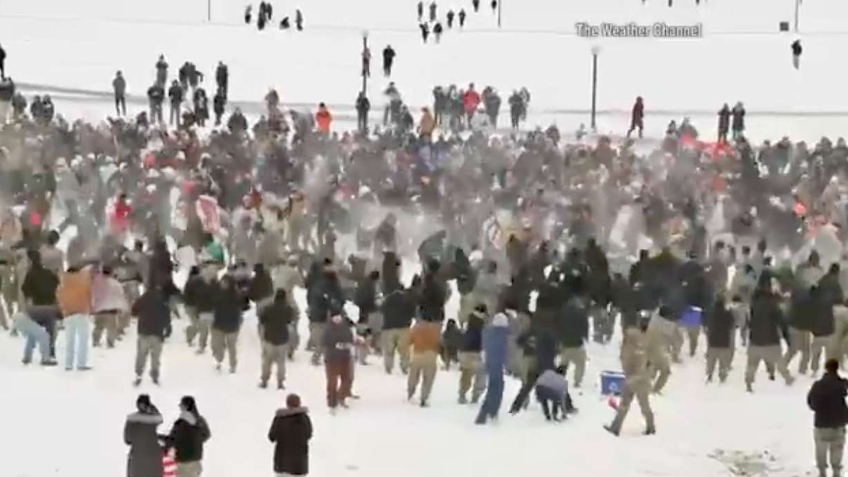 Virginia Tech students and cadets engage in a massive snowball fight at the Blacksburg, Virginia, university on Feb. 11.