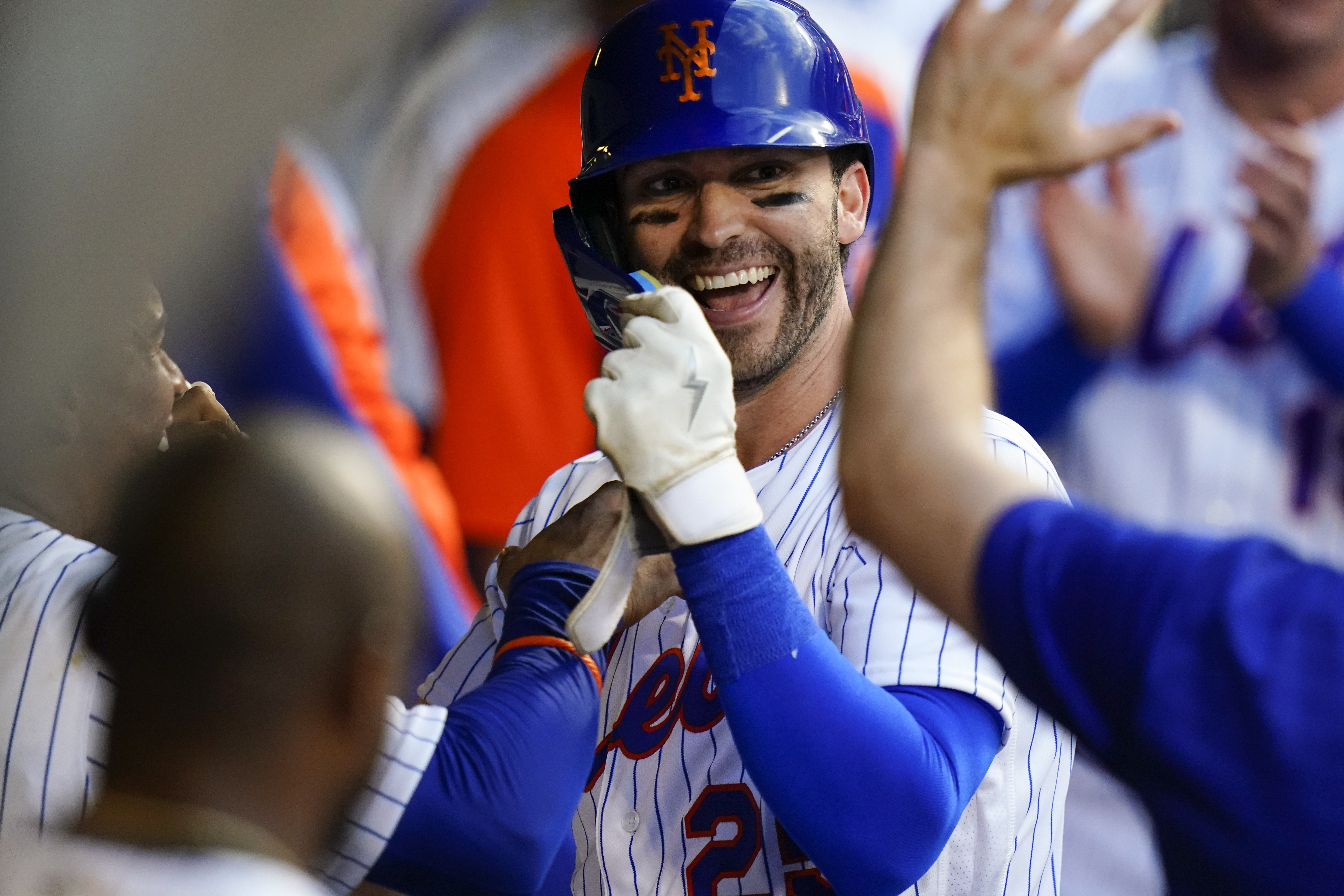 FILE - New York Mets' Tyler Naquin celebrates with teammates after hitting a home run during the second inning of the team's baseball game against the Atlanta Braves on Aug. 4, 2022, in New York. 