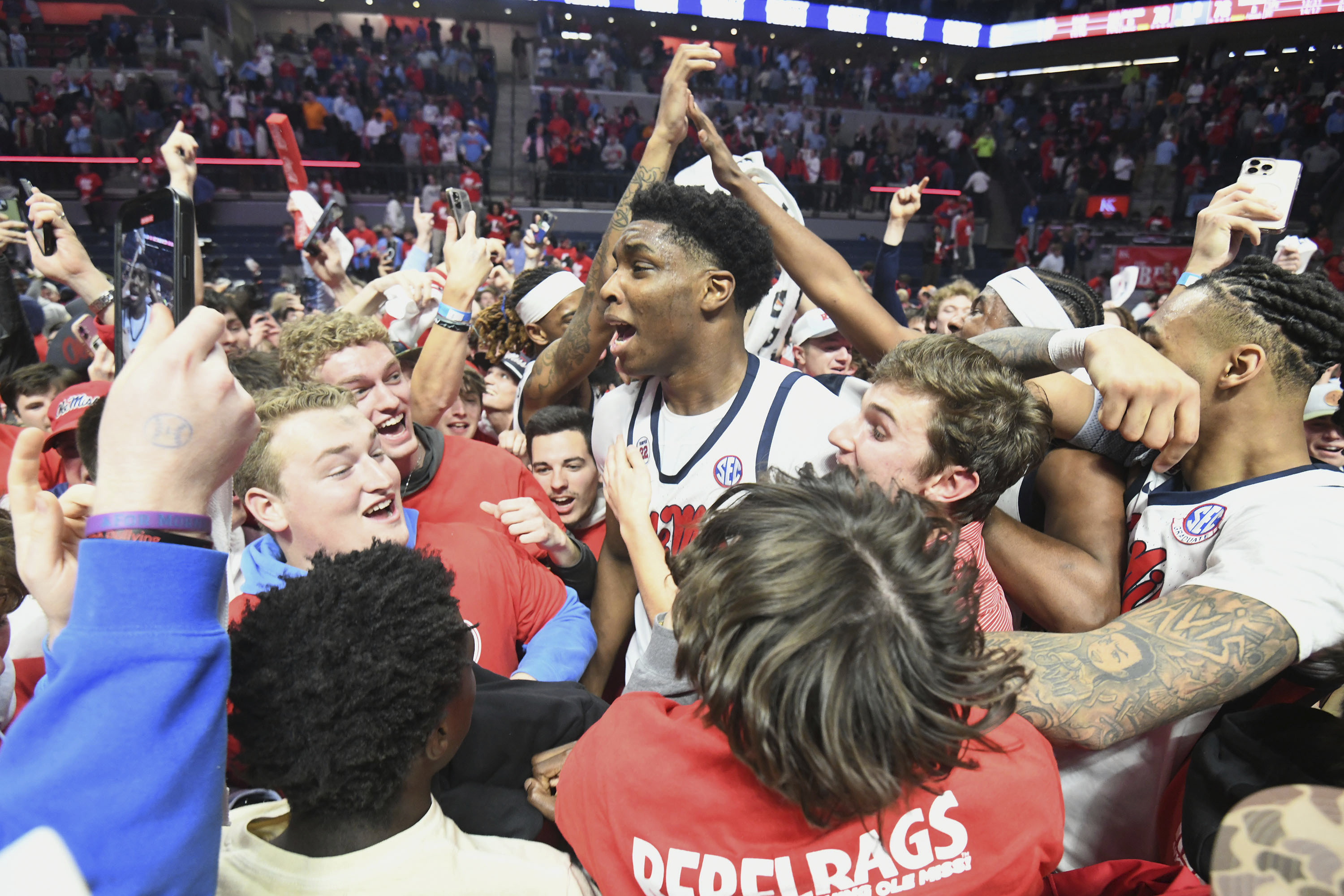 Mississippi forward Malik Dia (0), center, celebrates a win over Tennessee following an NCAA college basketball game in Oxford, Miss., Wednesday, March 5, 2025. 