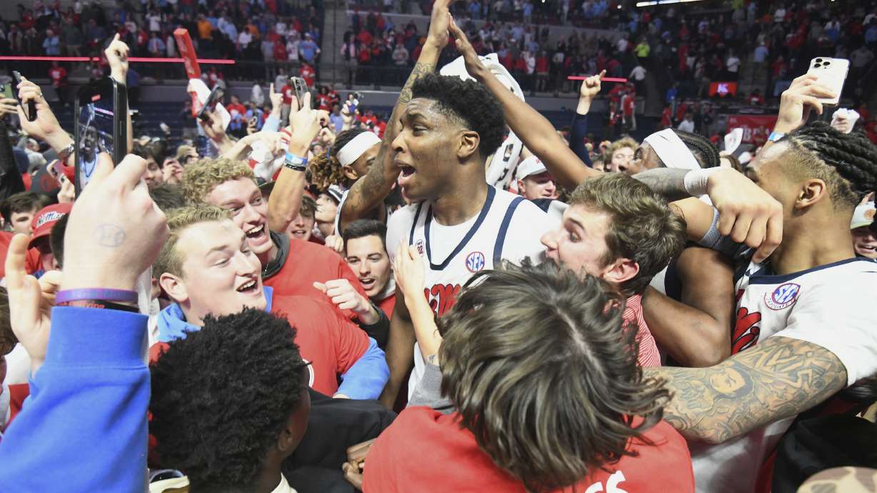 Mississippi forward Malik Dia (0), center, celebrates a win over Tennessee following an NCAA college basketball game in Oxford, Miss., Wednesday, March 5, 2025.