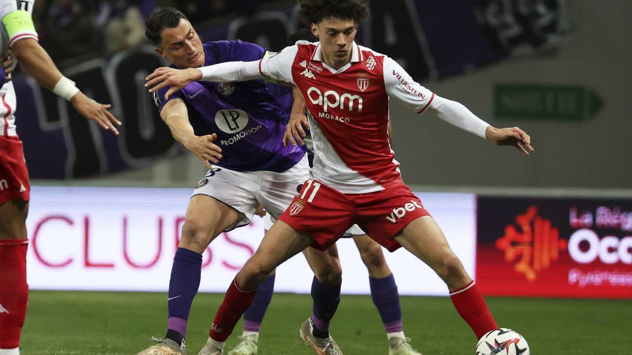 Monaco's Maghnes Akliouche controls the ball during the French League One soccer match between Toulouse and Monaco Friday, March 7, 2025 at the Toulouse stadium, southwestern France.