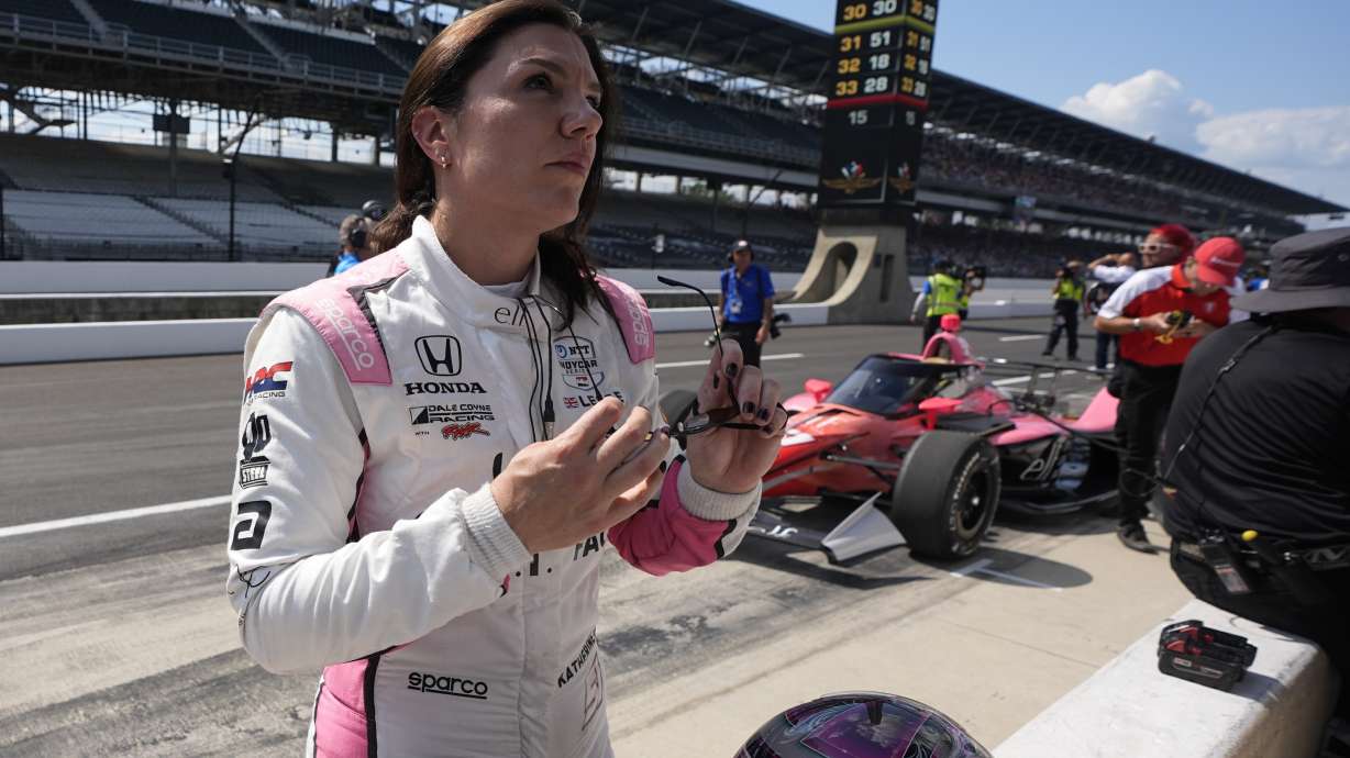 FILE - Katherine Legge, of England, looks at her time during qualifications for the Indianapolis 500 auto race at Indianapolis Motor Speedway, Sunday, May 19, 2024, in Indianapolis.