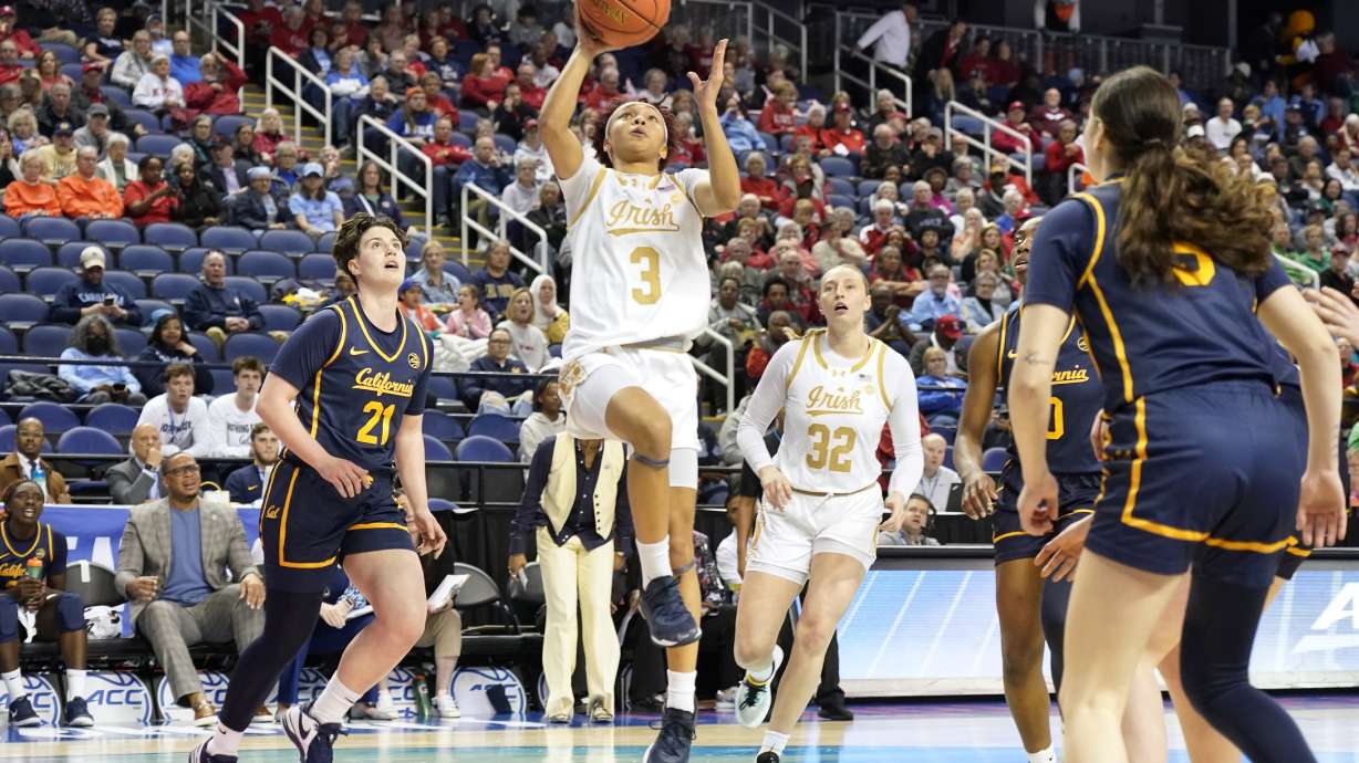 Notre Dame guard Hannah Hidalgo (3) drives past California guard Ioanna Krimili (21) during an NCAA college basketball game in the quarterfinals of the Atlantic Coast Conference tournament Greensboro, N.C., Friday, March 7, 2025.