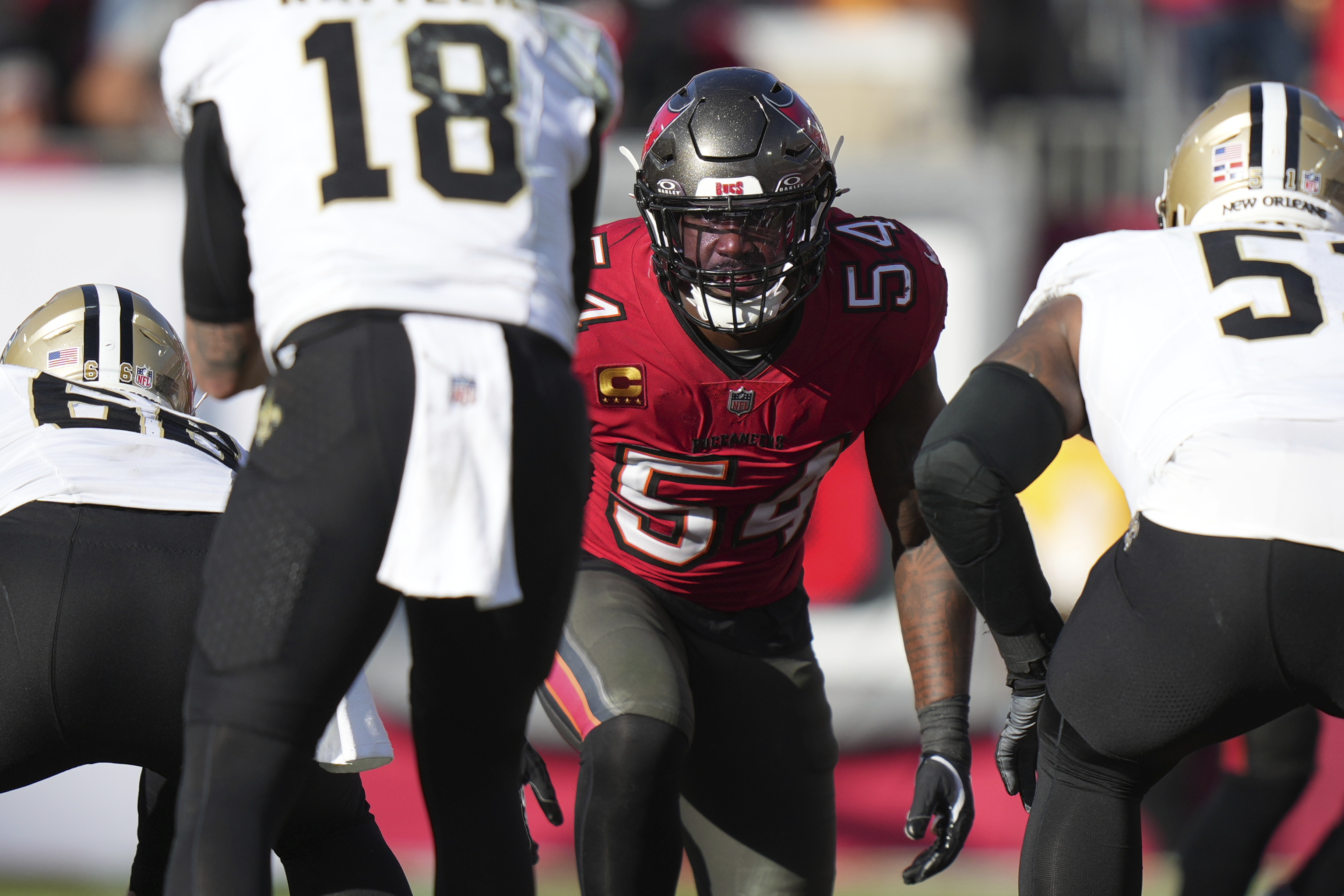 FILE - Tampa Bay Buccaneers linebacker Lavonte David (54) yes the passer before a snap during an NFL football game against the New Orleans Saints, on Jan 5, 2025, in Tampa, Fla. 