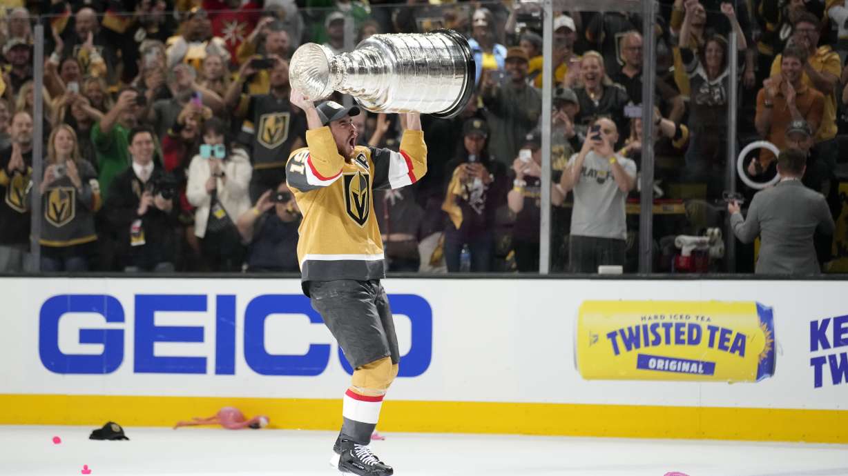 FILE - Vegas Golden Knights right wing Reilly Smith skates with the Stanley Cup after the Knights defeated the Florida Panthers in Game 5 of the NHL hockey Stanley Cup Finals, June 13, 2023, in Las Vegas.