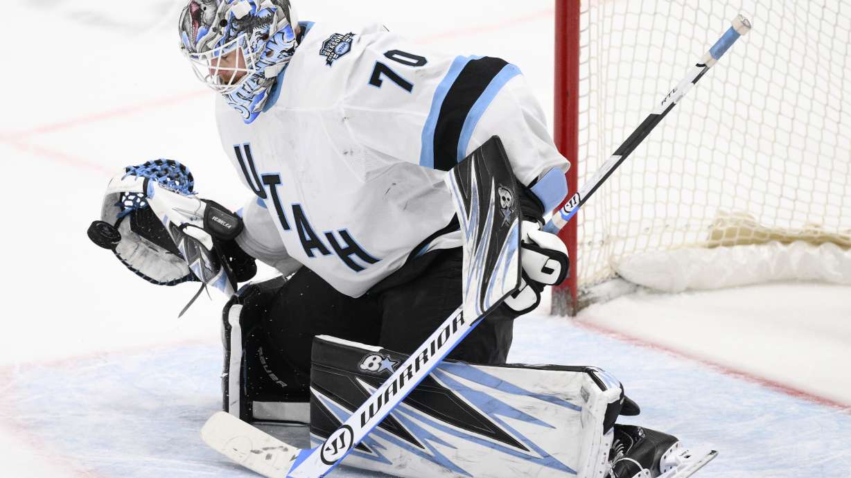 Utah Hockey Club goaltender Karel Vejmelka stops the puck during a shootout of an NHL hockey game against the Washington Capitals, Sunday, Feb. 9, 2025, in Washington.