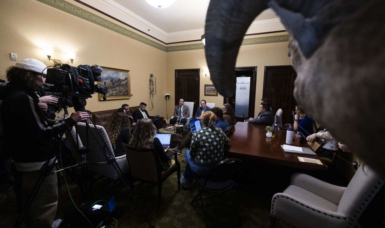 A taxidermy bighorn sheep in House Speaker Mike Schultz’s office looks over a press availability meeting, while Schultz answers questions asked by the media, at the Capitol in Salt Lake City on Friday.