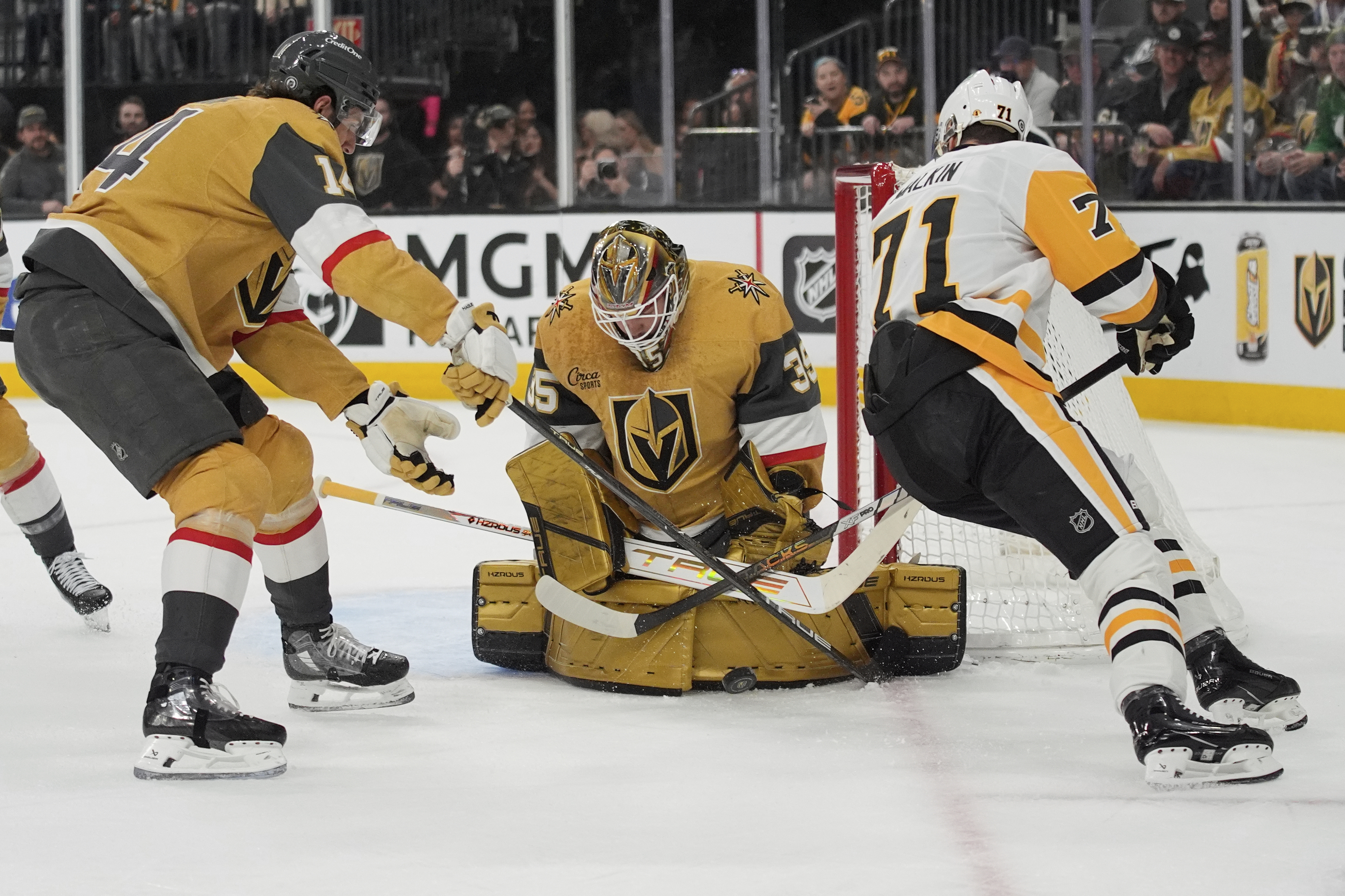 Vegas Golden Knights goaltender Ilya Samsonov (35) blocks a shot by Pittsburgh Penguins center Evgeni Malkin (71) during the first period of an NHL hockey game Friday, March 7, 2025, in Las Vegas.