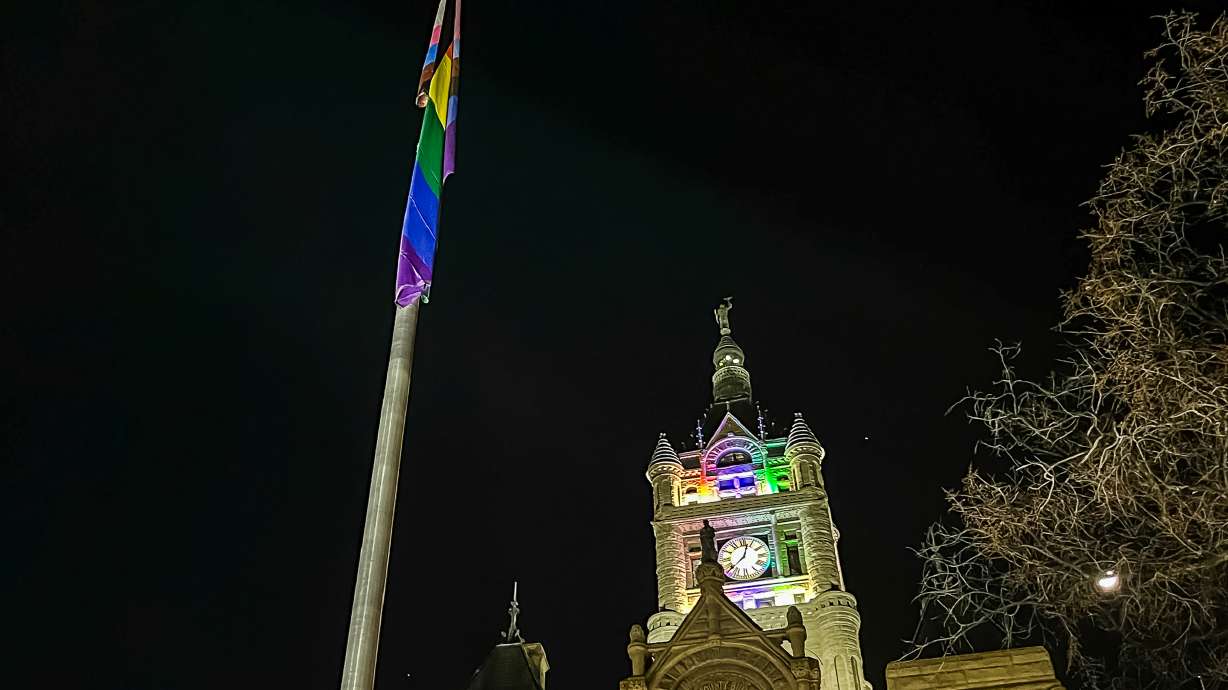 A progress Pride flag flies outside of the Salt Lake City-County Building in Salt Lake City on March 8. Utah lawmakers advanced a law requiring cities to fly only a single official flag in schools, airports and courthouses.