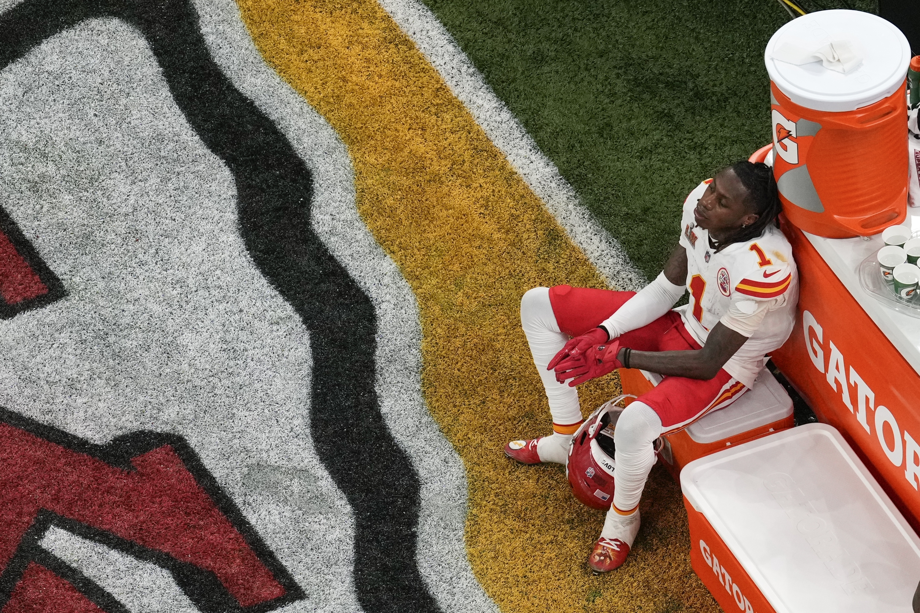 Kansas City Chiefs wide receiver Xavier Worthy (1) sits on a cooler during the second half of the NFL Super Bowl 59 football game against the Philadelphia Eagles, Sunday, Feb. 9, 2025, in New Orleans.