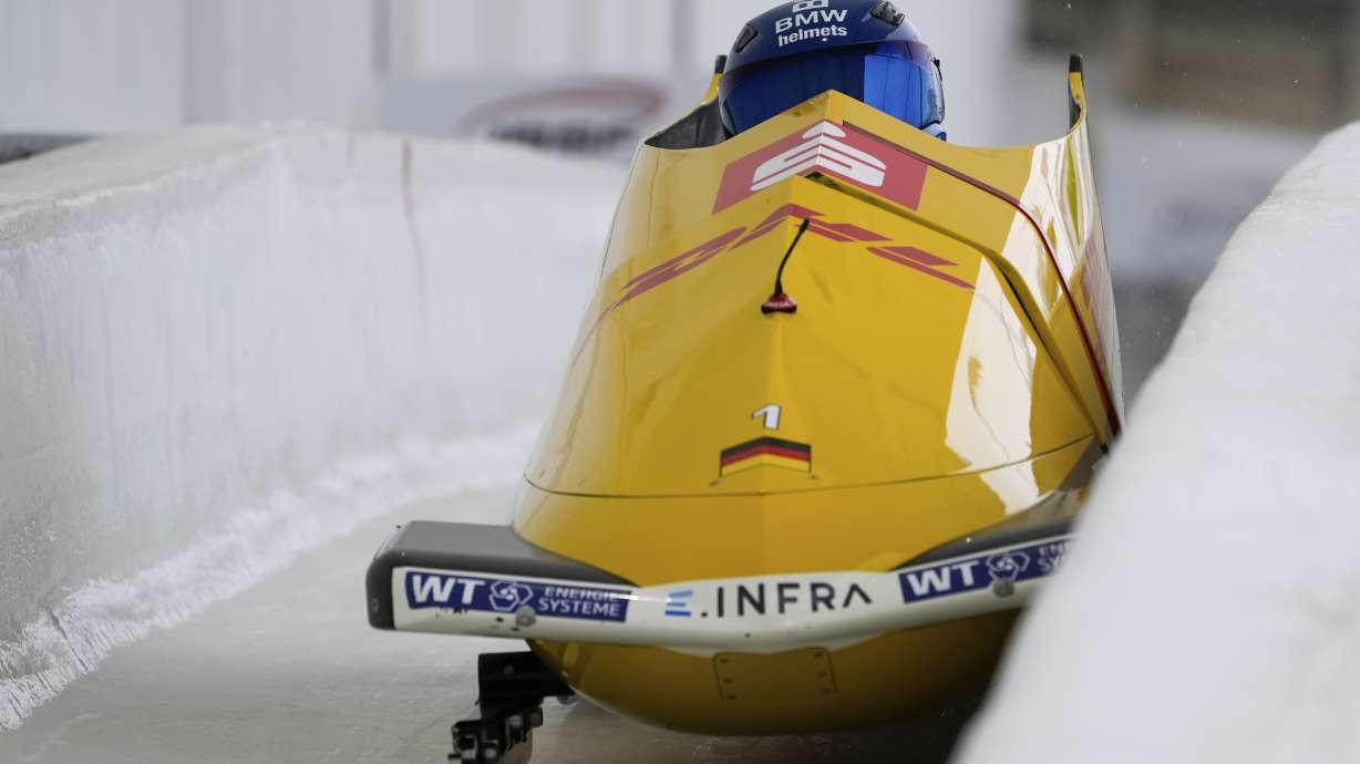 Francesco Friedrich and Alexander Schuller, of Germany, take a curve during their second run in the two-man bobsled at the bobsleddiing world championships, Saturday, March 8, 2025, in Lake Placid, N.Y.