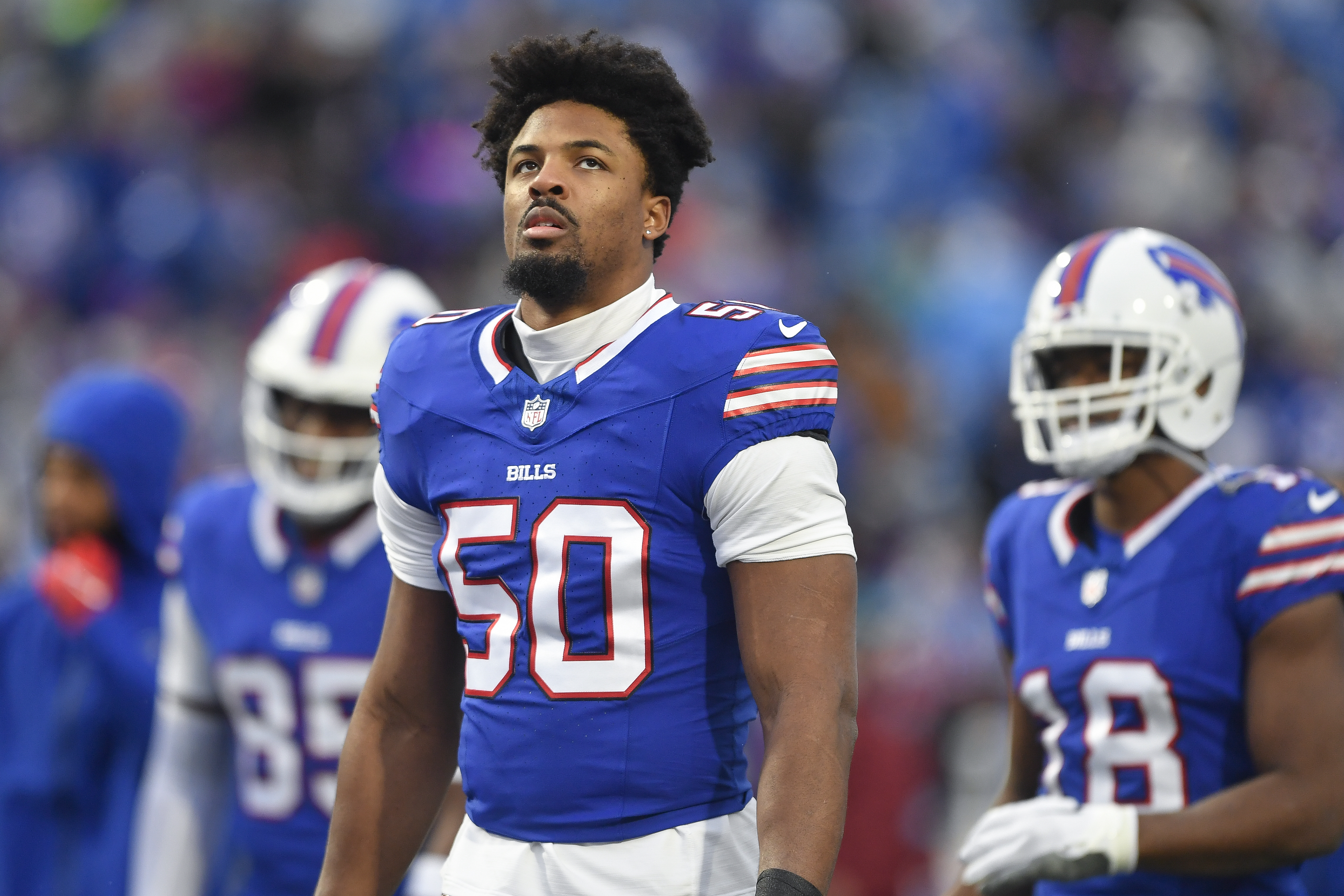 FILE - Buffalo Bills defensive end Greg Rousseau (50) warms up before an NFL football game against the New York Jets in Orchard Park, N.Y., Sunday, Dec. 29, 2024. 