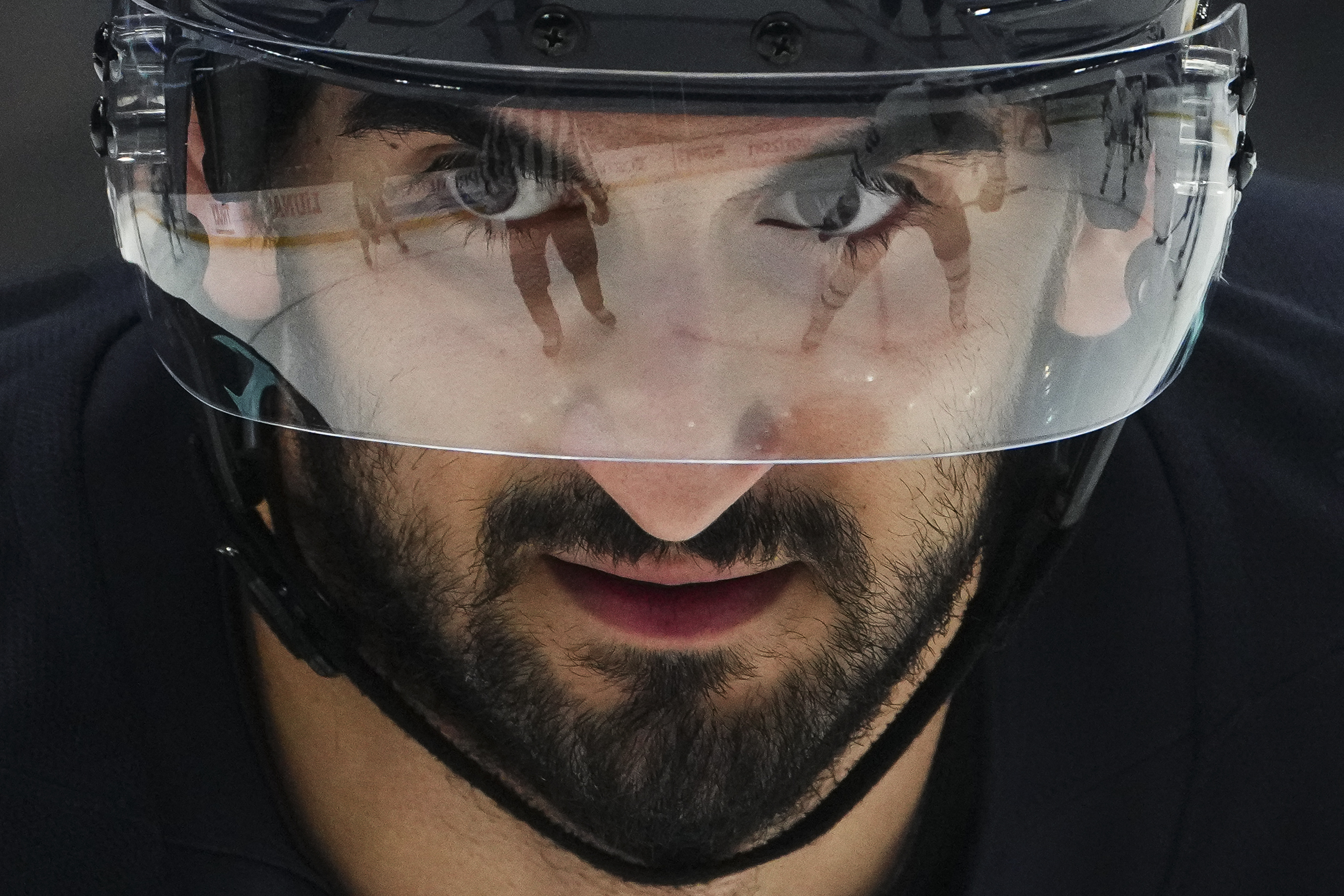 Seattle Kraken center Matty Beniers looks on during a face-off against the Toronto Maple Leafs during the second period of an NHL hockey game Thursday, Feb. 6, 2025, in Seattle. 
