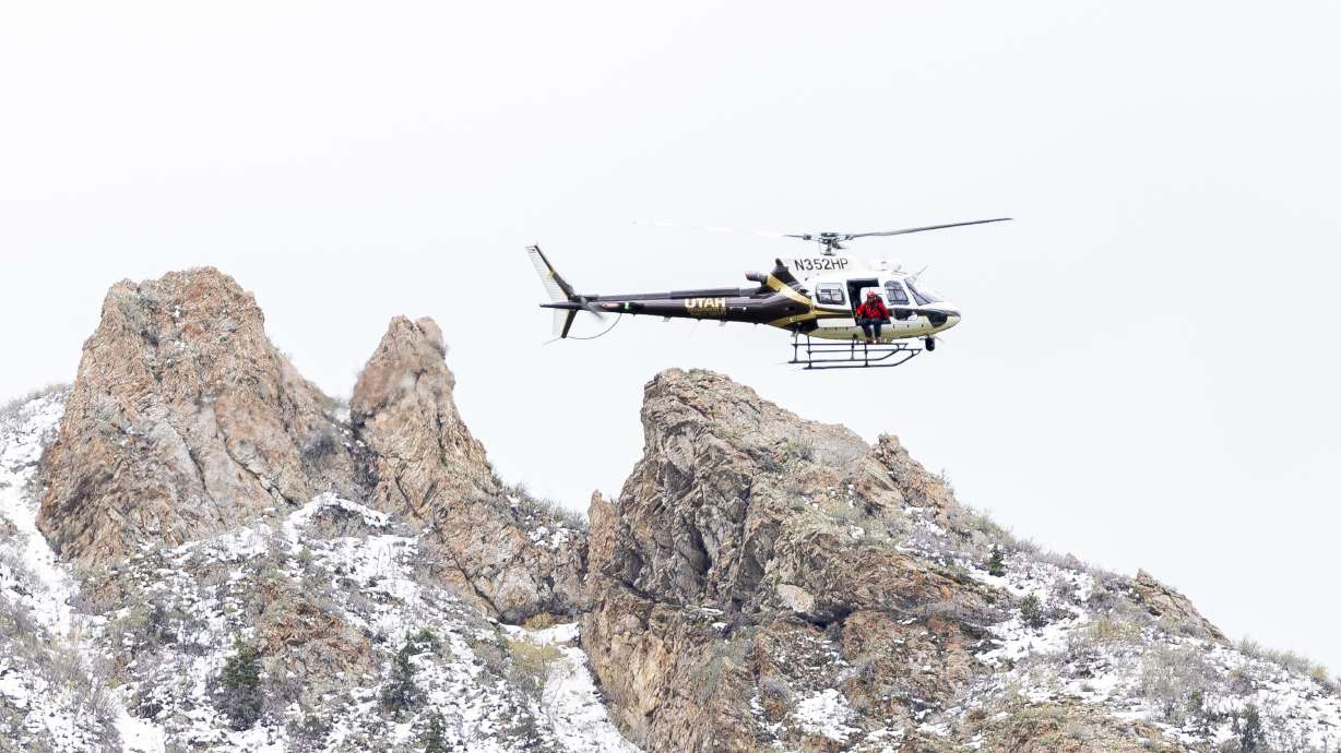 A Utah Department of Public Safety helicopter flies after an avalanche on May 9, 2024. Search and rescue teams on Saturday found a 51-year-old Summit County man dead after an avalanche in the Uintas.