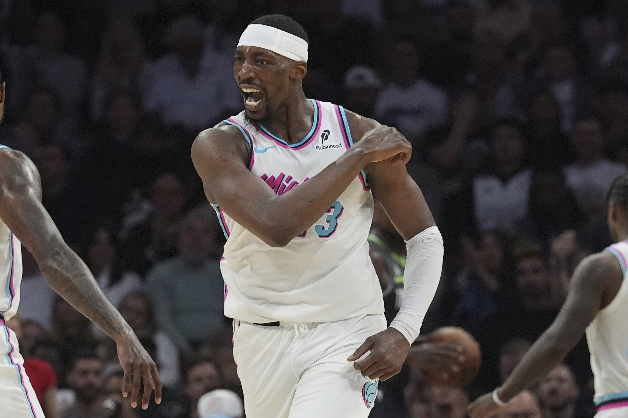Miami Heat center Bam Adebayo (13) gestures after scoring during the second half of an NBA basketball game against the Minnesota Timberwolves, Friday, March 7, 2025, in Miami. 