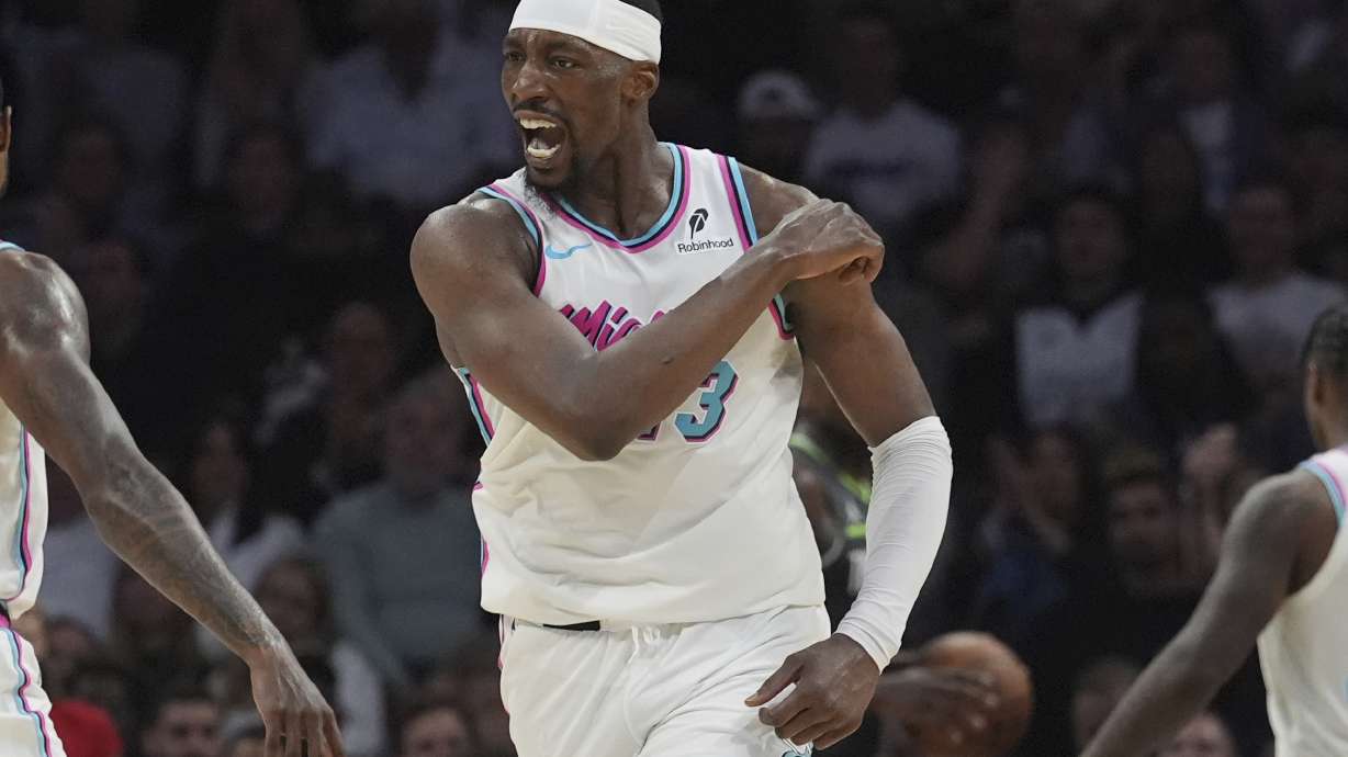 Miami Heat center Bam Adebayo (13) gestures after scoring during the second half of an NBA basketball game against the Minnesota Timberwolves, Friday, March 7, 2025, in Miami.