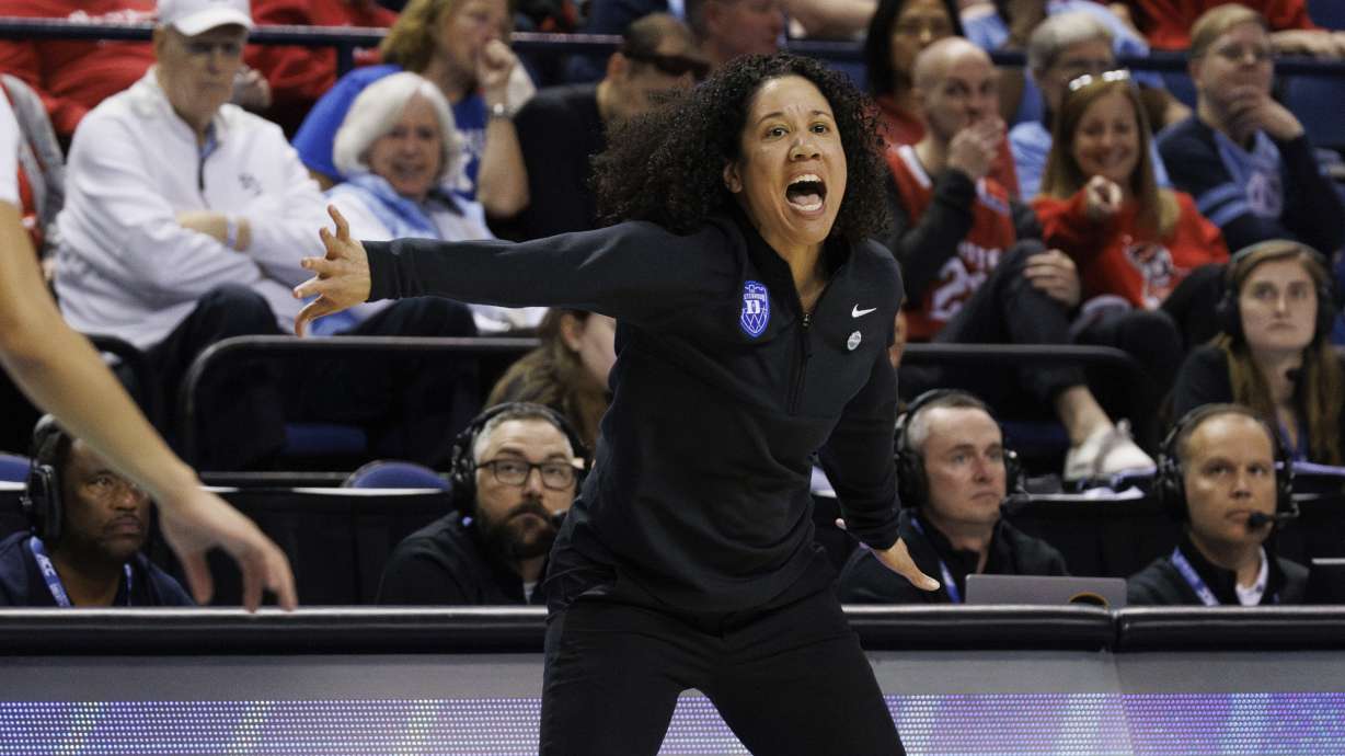 Duke head coach Kara Lawson shouts towards the court during an NCAA college basketball game against Notre Dame in the semifinals of the Atlantic Coast Conference tournament in Greensboro, N.C., Saturday, March 8, 2025.