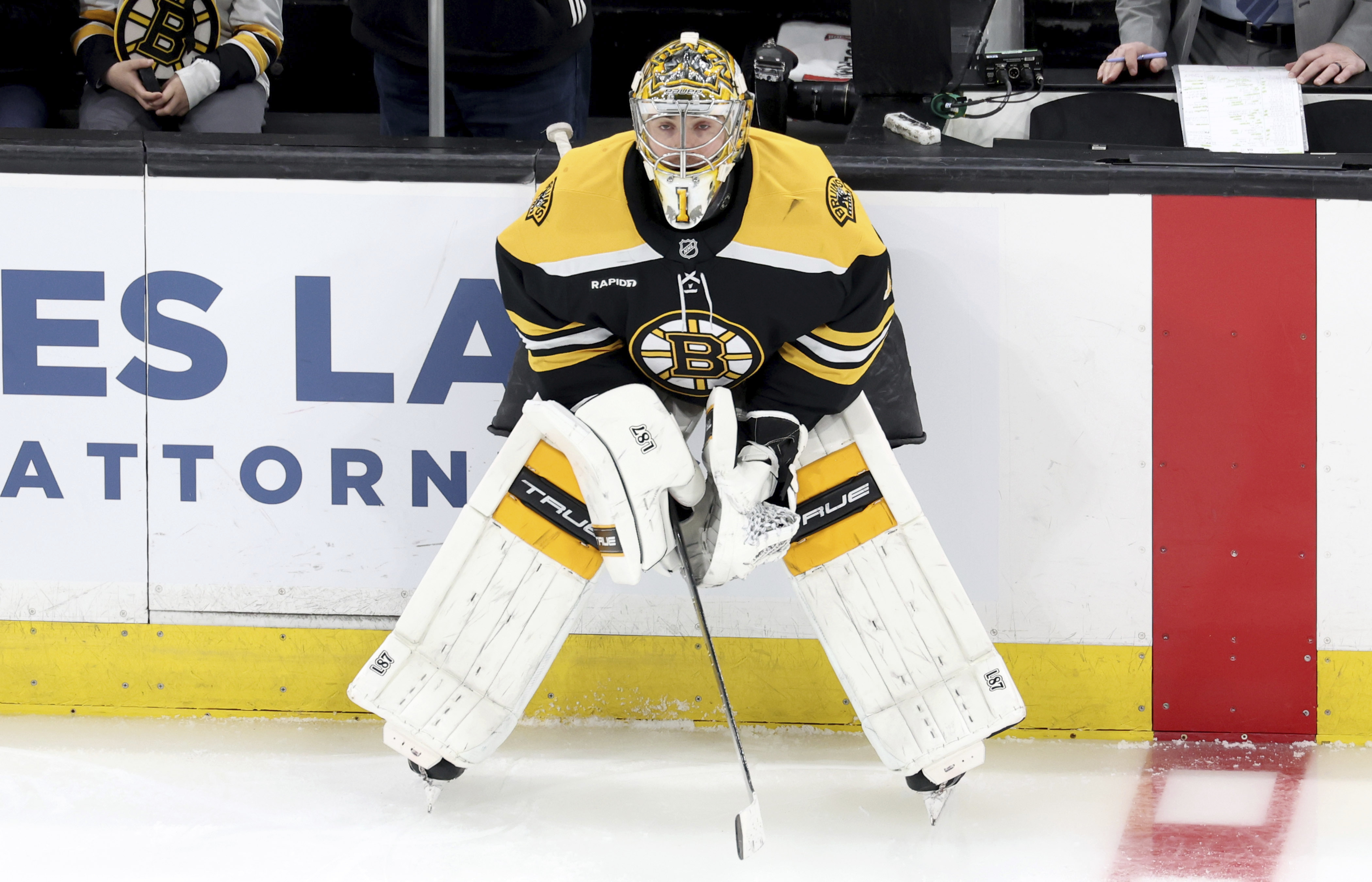 Boston Bruins goaltender Jeremy Swayman (1) stretches before an NHL hockey game against the Vegas Golden Knights, Saturday, Feb. 8, 2025, in Boston.