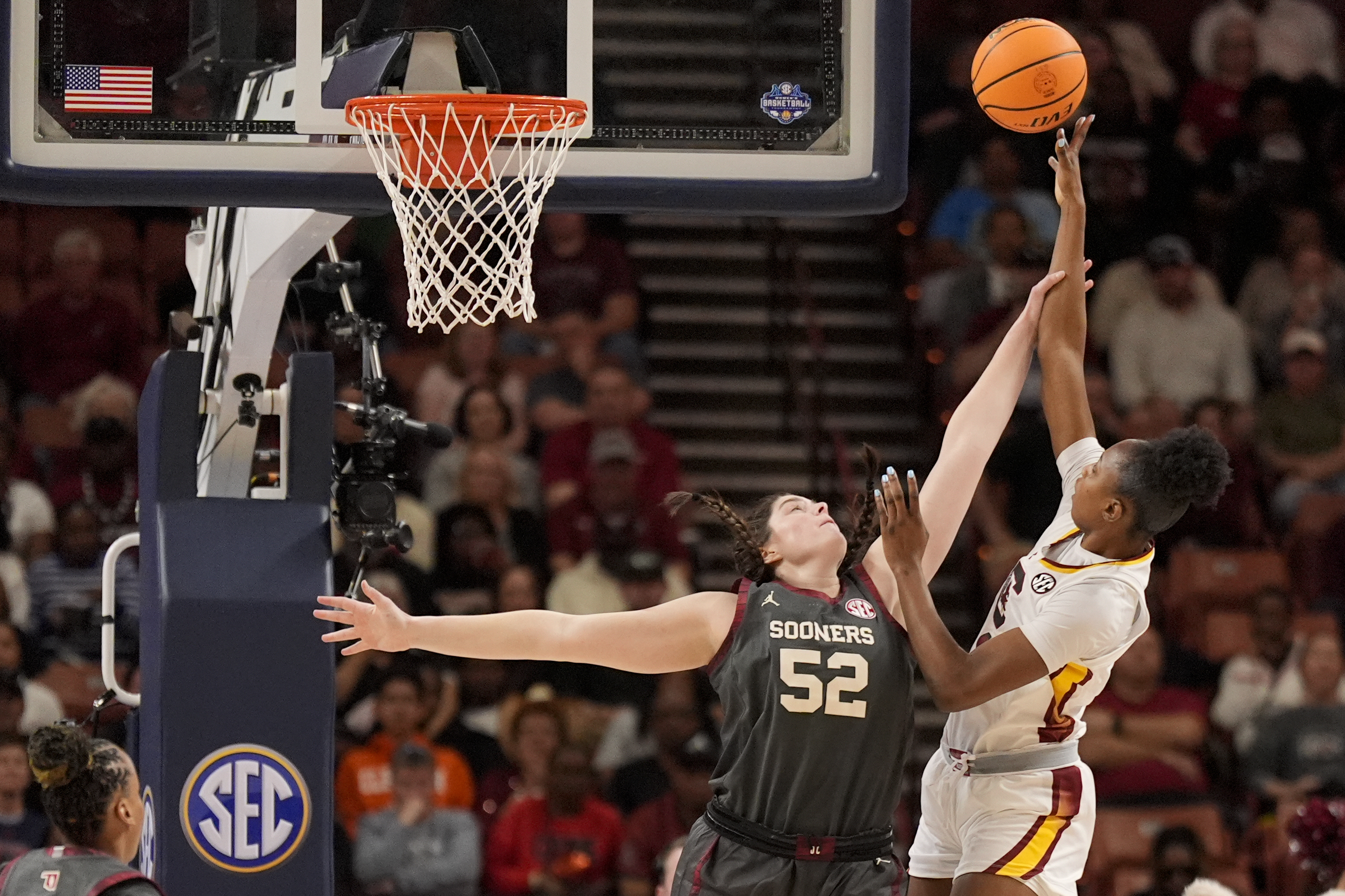 South Carolina forward Joyce Edwards is fouled by Oklahoma center Raegan Beers during the first half during of an NCAA college basketball game in the semifinals of the Southeastern Conference tournament, Saturday, March 8, 2025, in Greenville, S.C.