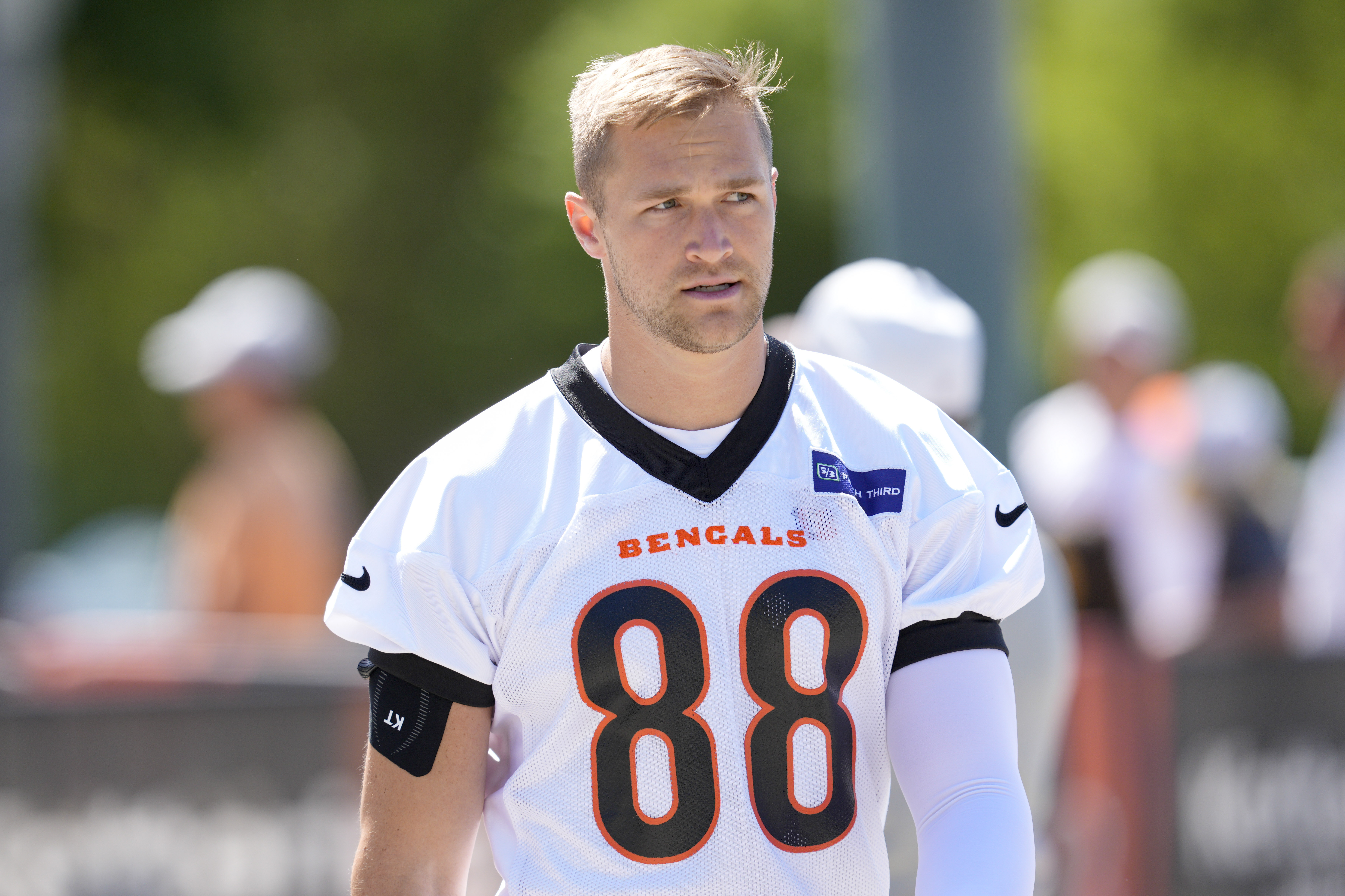 FILE - Cincinnati Bengals tight end Mike Gesicki walks to an NFL football practice, May 28, 2024, in Cincinnati. 