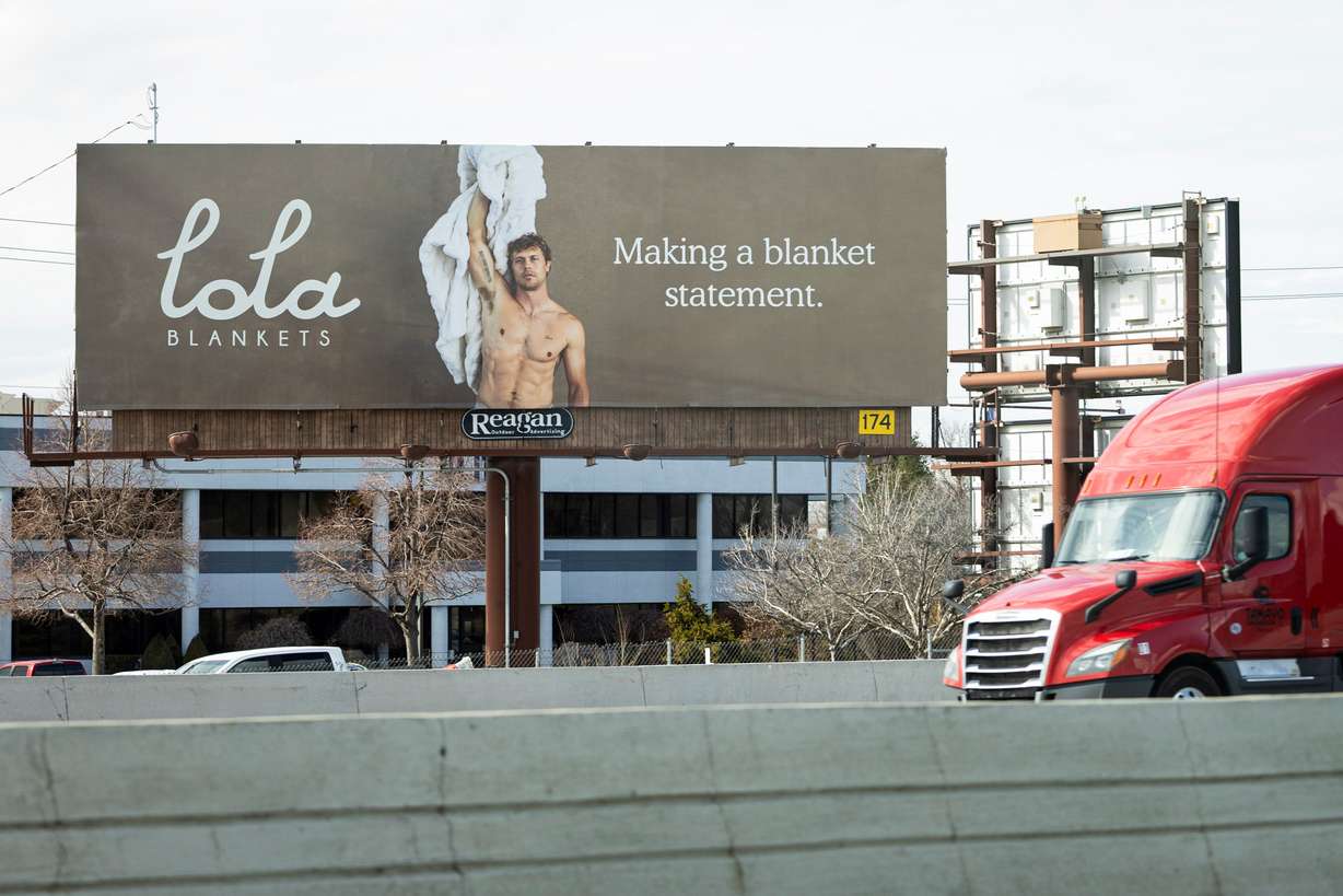 A billboard for Lola Blankets is posted along I-15 in Sandy on Tuesday, March 4.