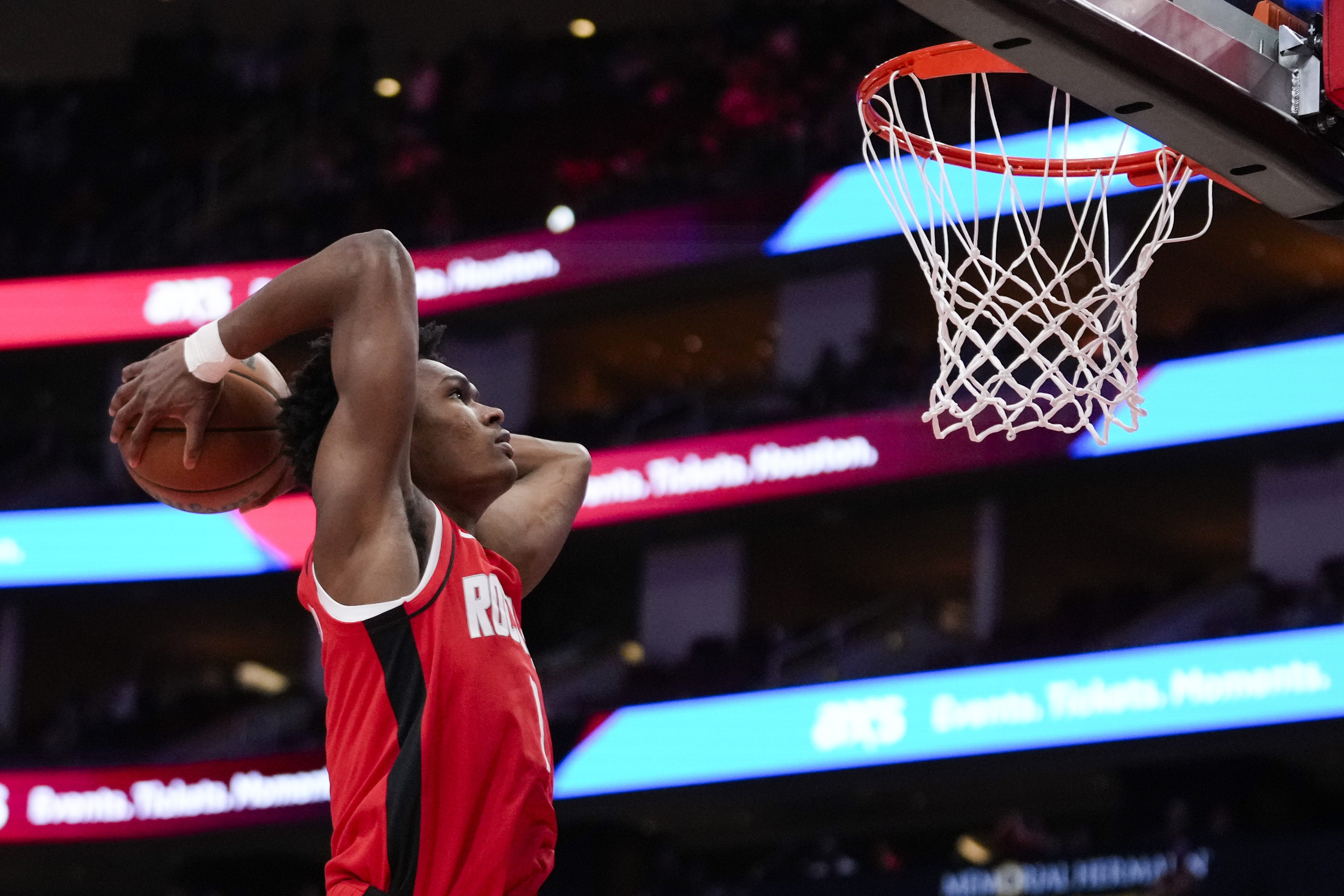 Houston Rockets forward Amen Thompson (1) dunks during the first half of an NBA basketball game against the New Orleans Pelicans in Houston, Saturday, March 8, 2025. 