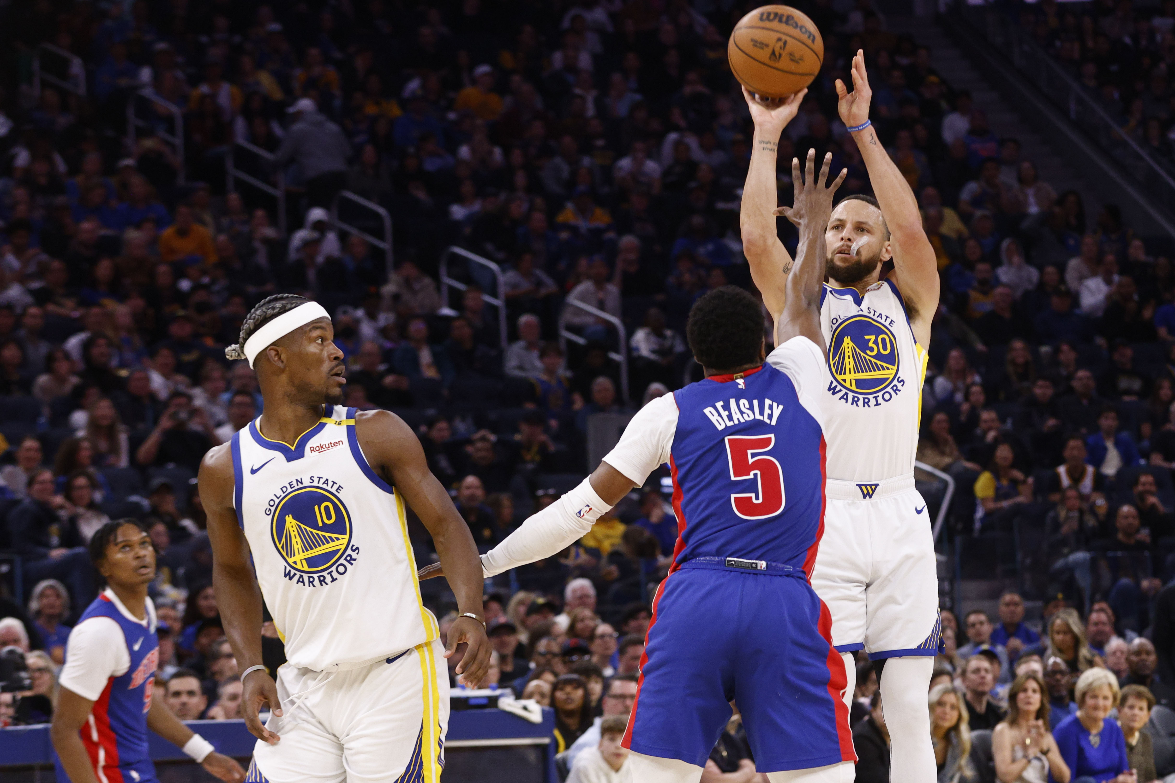 Golden State Warriors guard Stephen Curry (30) attempts a three-pointer against Detroit Pistons guard Malik Beasley (5) in the second quarter of an NBA basketball game in San Francisco, Saturday, March 8, 2025.