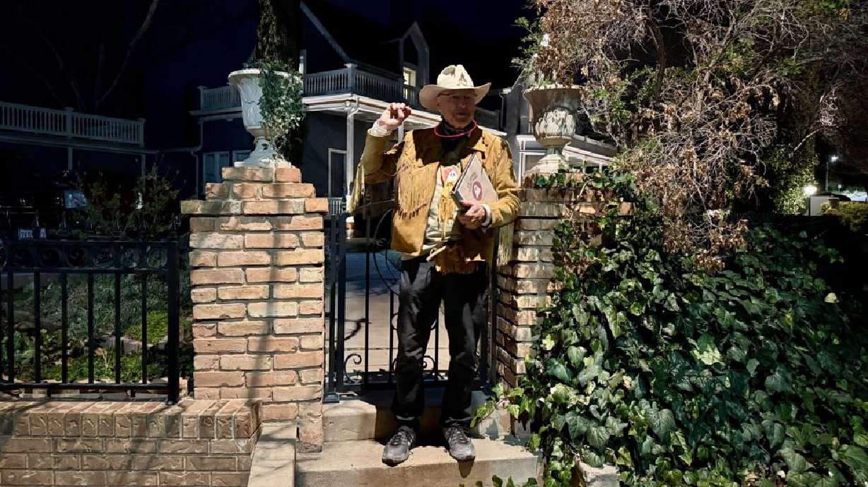 Guide Terry Turner tells creepy tales of a doll inside the Mulberry Inn in St. George, March 6.