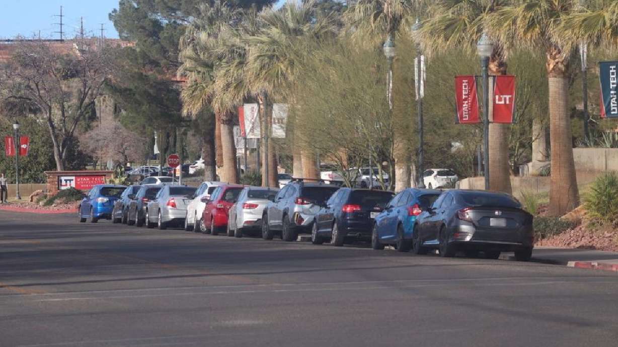 Cars lined up along 700 East in front of Utah Tech University. These parking spots will disappear once the city creates a two-lane bike track along the east side of 700 East between 600 South and St. George Boulevard, St. George, Feb. 28.