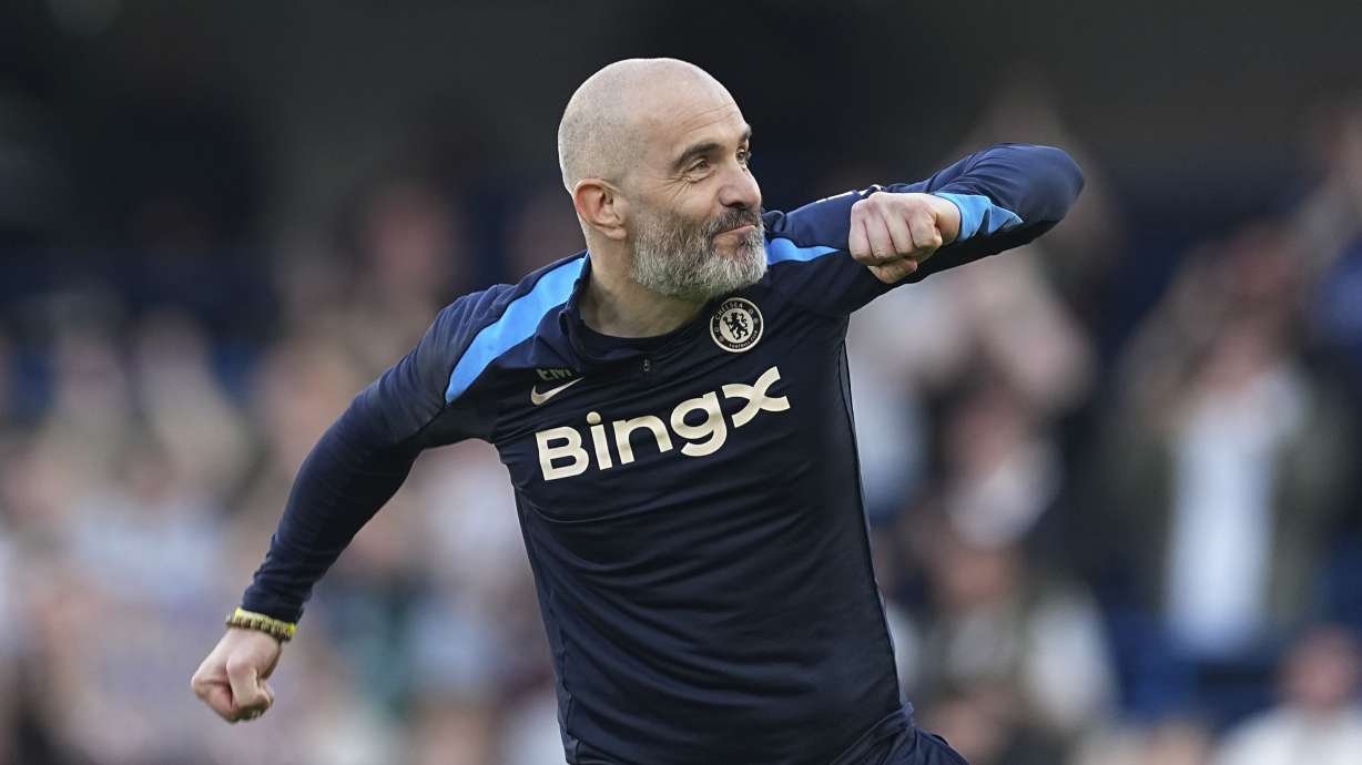 Chelsea's head coach Enzo Maresca celebrates at the end of the English Premier League soccer match between Chelsea and Leicester City, at the Stamford Bridge stadium in London, Sunday, March 9, 2025.
