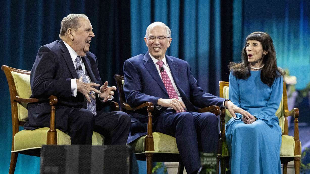Elder Jeffrey R. Holland speaks as he’s joined by Elder Neil L. Andersen and Sister Kathy Andersen during the final day of RootsTech 2025 at the Salt Palace Convention Center in Salt Lake City on Saturday.