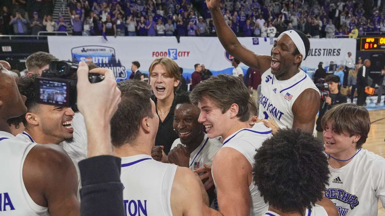High Point players celebrate on the court after winning the Big South Championship NCAA college basketball game against Winthrop, Sunday, March 9, 2025, in Johnson City, Tenn.
