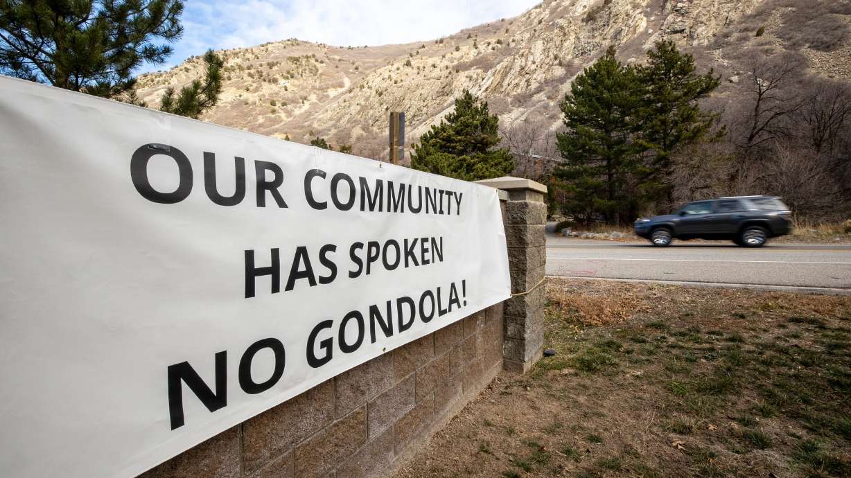 A sign opposed to a gondola is pictured near the mouth of Little Cottonwood Canyon in Cottonwood Heights on Dec. 7, 2021. Homeowners near the mouth of Little Cottonwood Canyon have filed a lawsuit to block a proposed gondola.