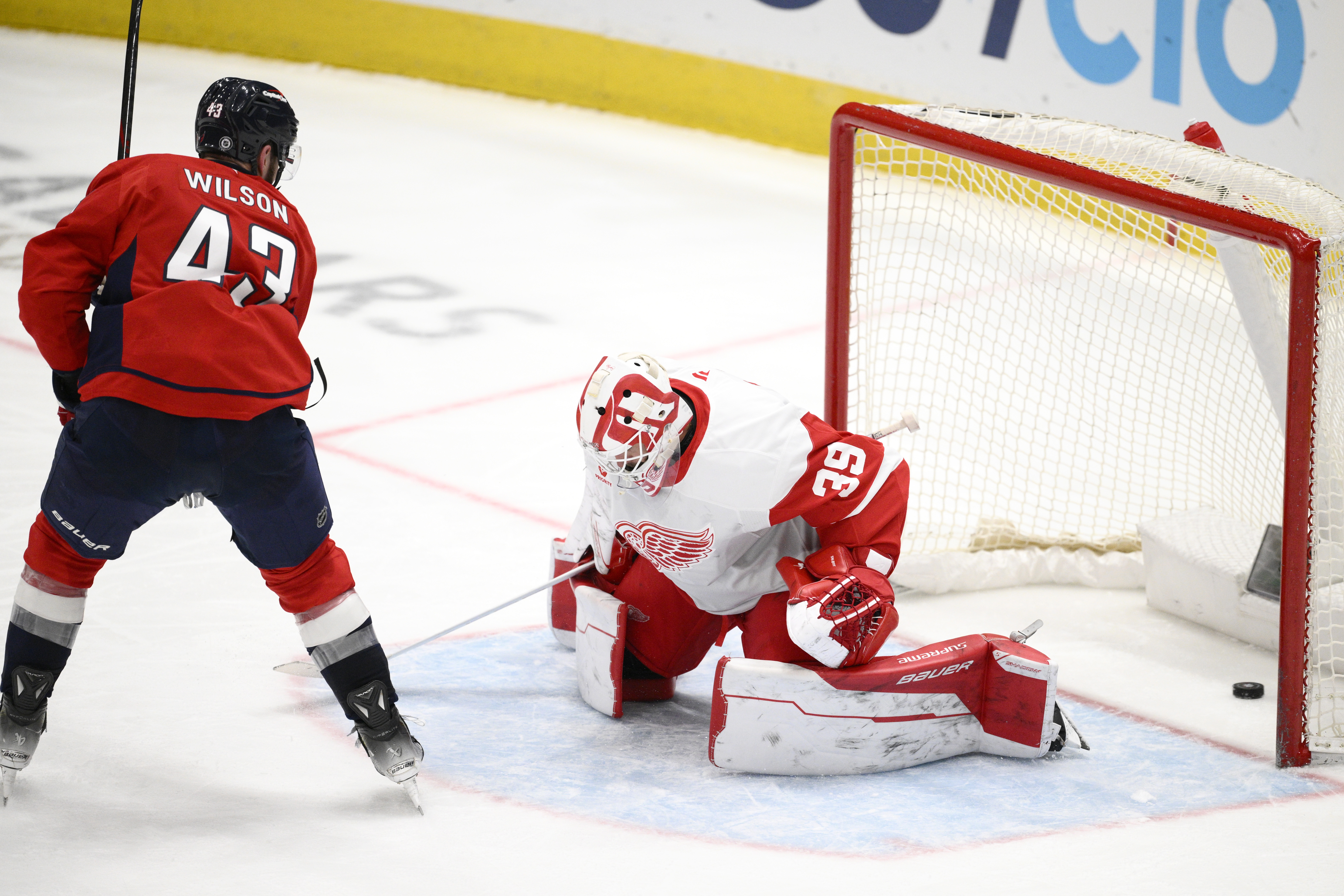 Washington Capitals right wing Tom Wilson (43) scores past Detroit Red Wings goaltender Cam Talbot (39) during the third period of an NHL hockey game, Friday, March 7, 2025, in Washington. 