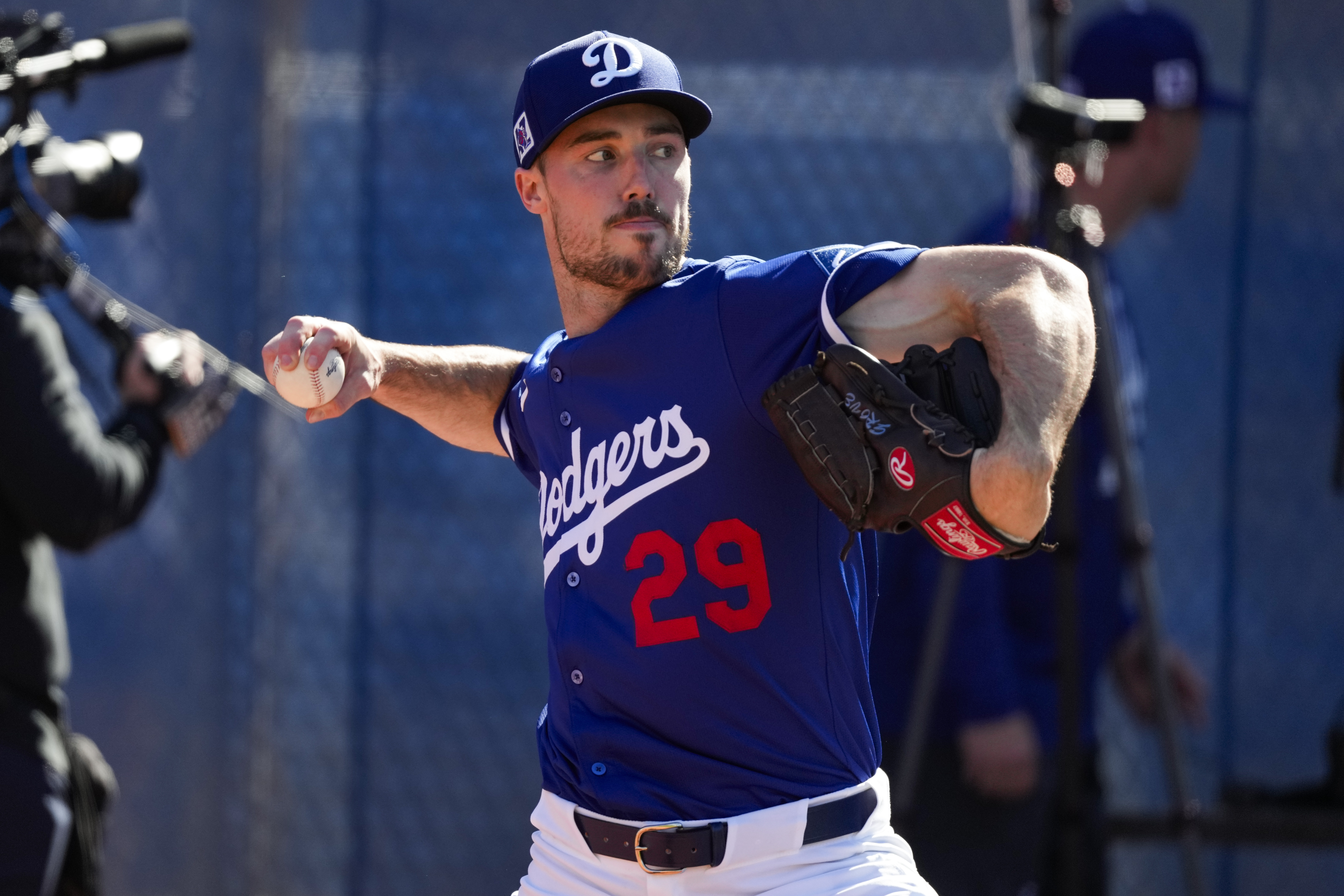 FILE - Los Angeles Dodgers pitcher Michael Grove (29) throws during spring training baseball practice, Feb. 15, 2025, in Phoenix. 