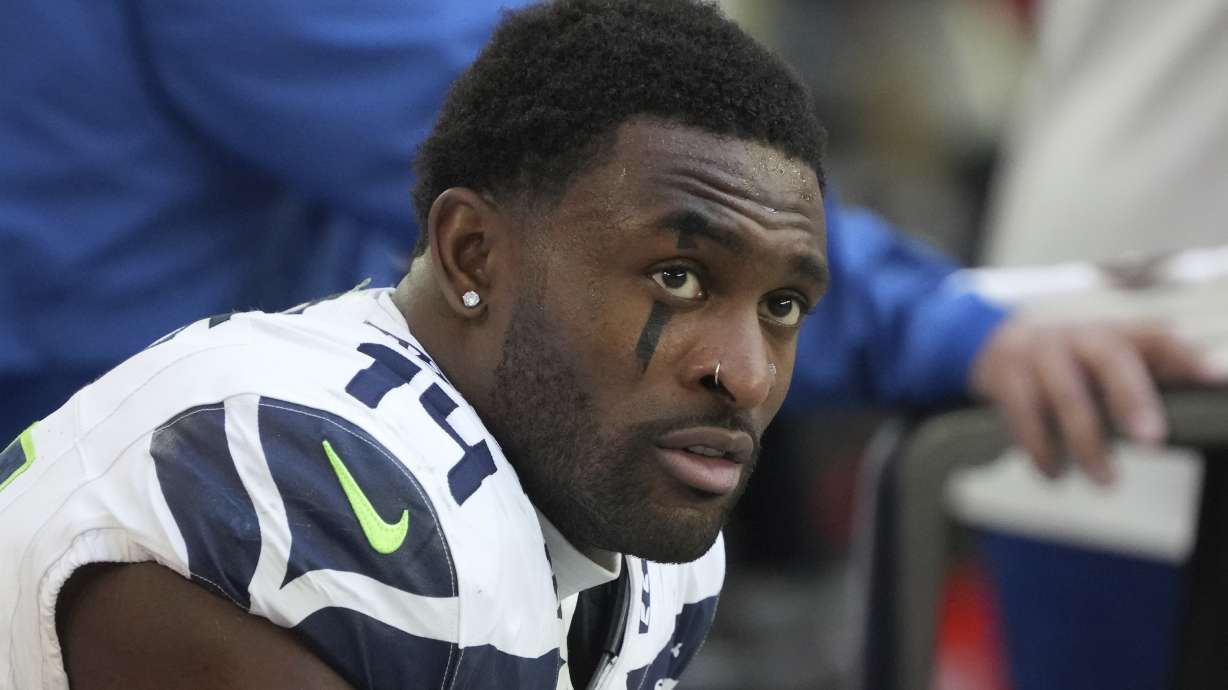 FILE - Seattle Seahawks wide receiver DK Metcalf (14) warms up before an NFL football game against the Arizona Cardinals, Sunday, Dec. 8, 2024, in Glendale, Ariz.
