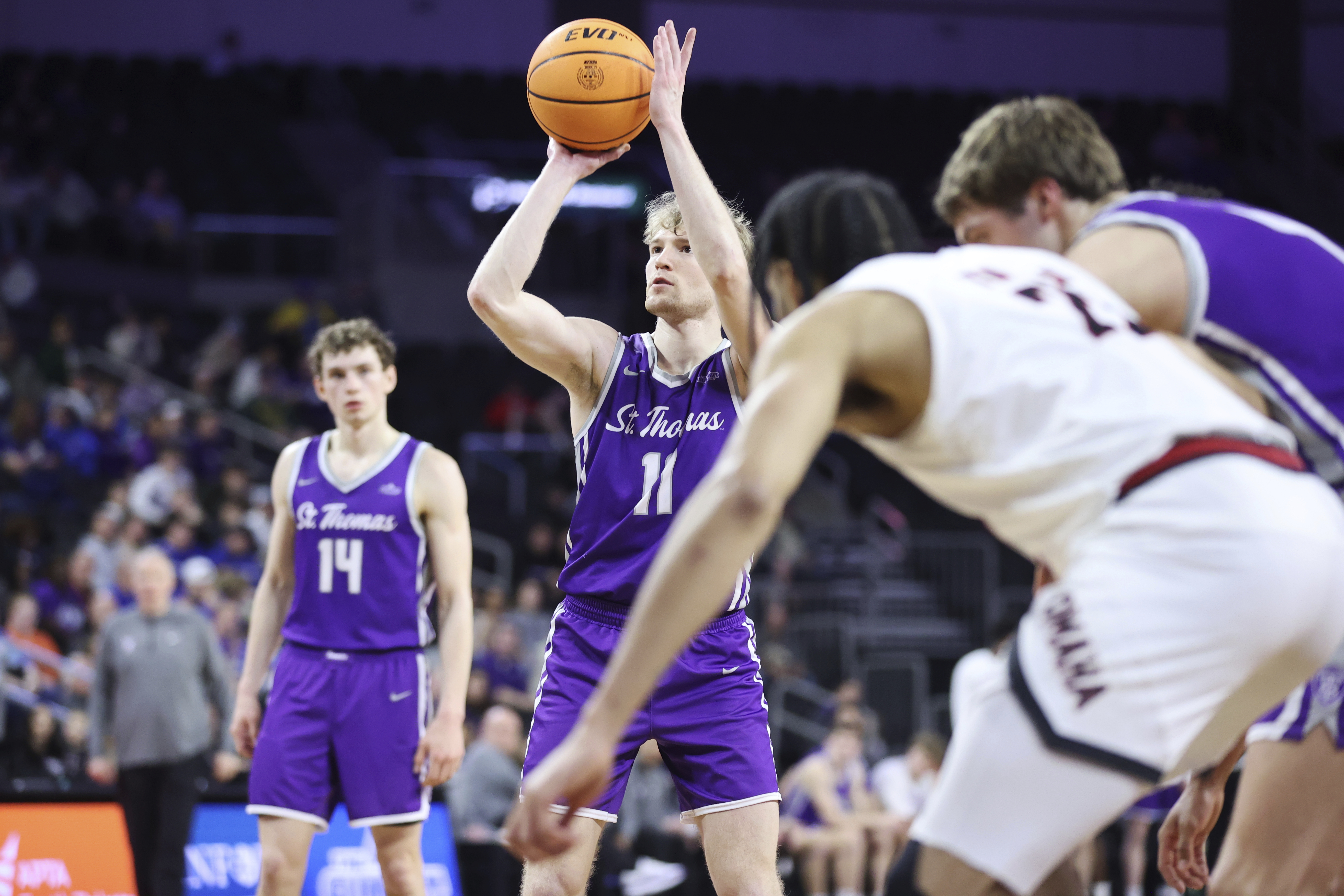 St Thomas guard Drake Dobbs (11) shoots a free throw attempt against Omaha during the first half of the championship game in the Summit League NCAA college basketball tournament Sunday, March 9, 2025, in Sioux Falls, S.D.