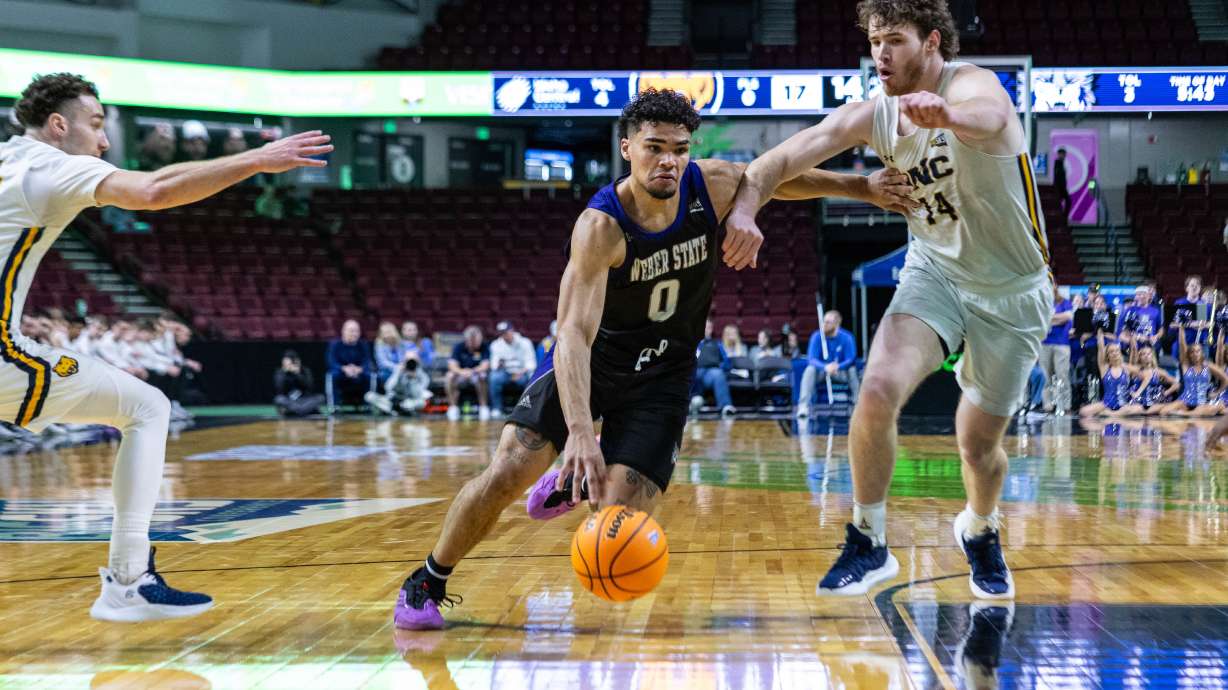 A Weber State player drives to the basket against top-seeded Northern Colorado in the second round of the Big Sky Tournament on March 9, 2025.