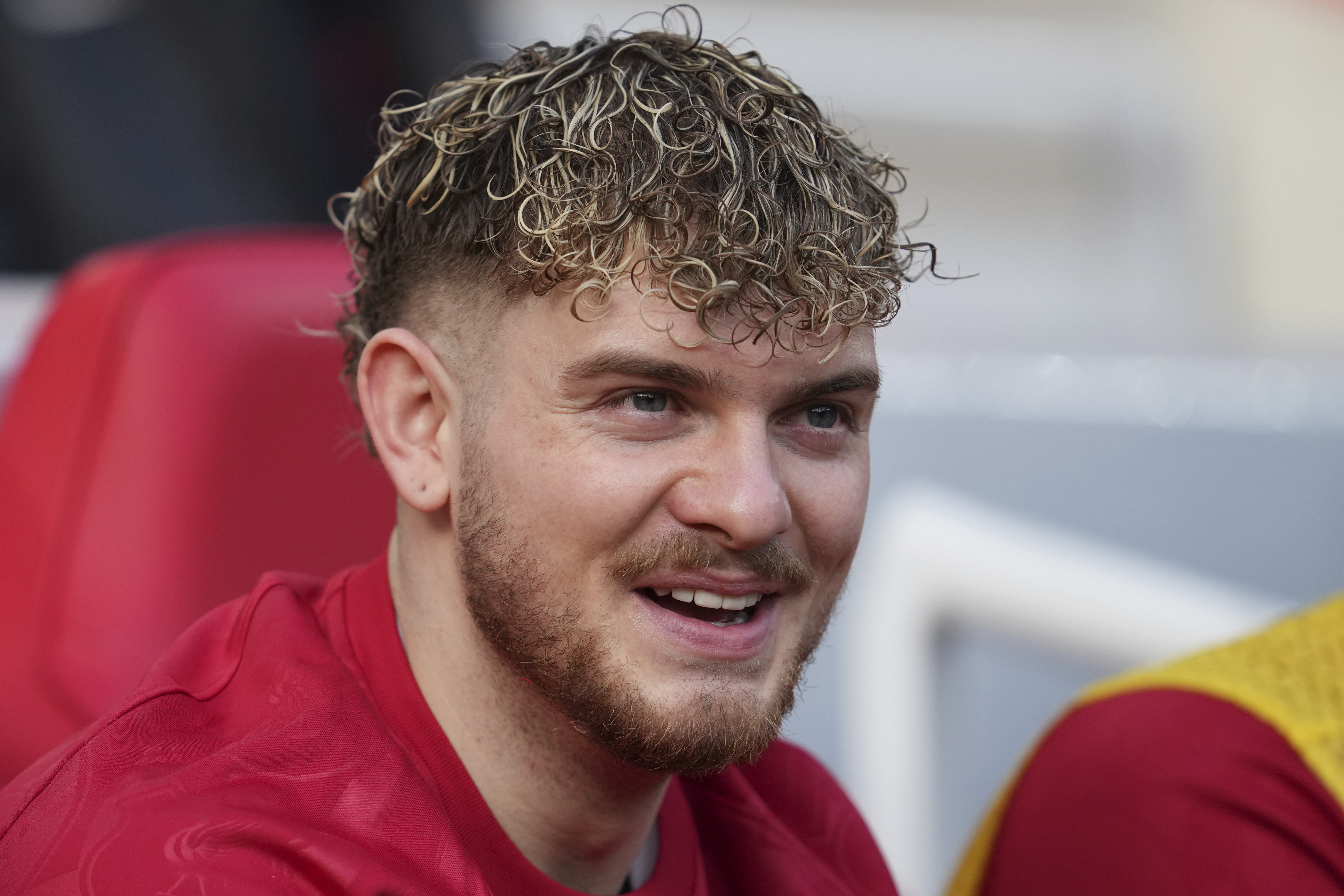 Liverpool's Harvey Elliott smiles ahead of the English Premier League soccer match between Liverpool and Southampton at Anfield in Liverpool, Saturday, March 8, 2025. 