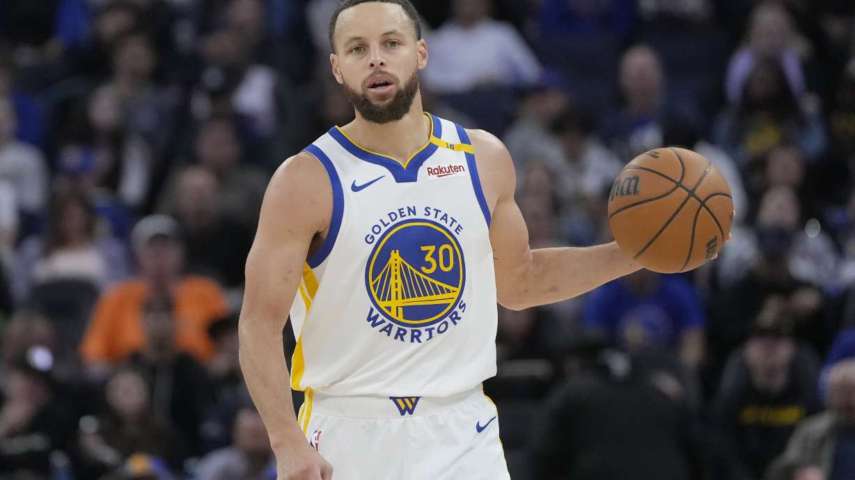 Golden State Warriors guard Stephen Curry (30) brings the ball up the court against the Detroit Pistons during the second half of an NBA basketball game in San Francisco, Saturday, March 8, 2025.