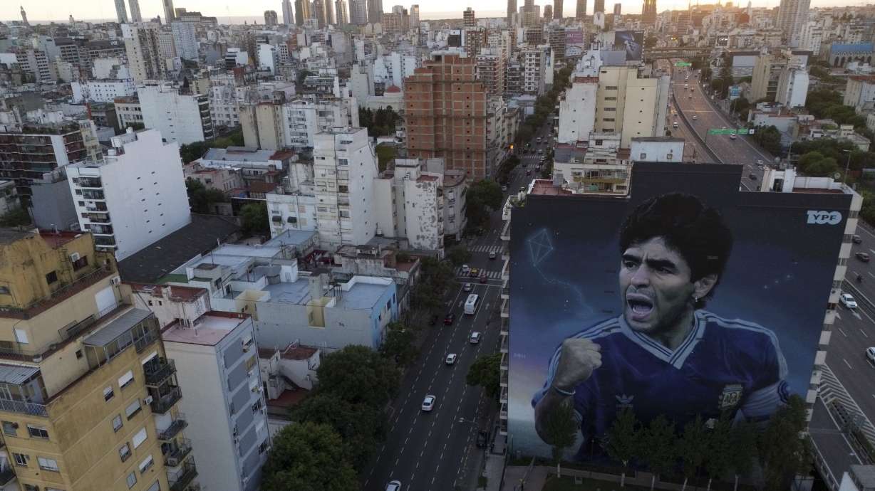 A large mural of the late soccer start Diego Maradona, by artist Martin Ron, stands in Buenos Aires, Argentina, Monday, March 10, 2025.
