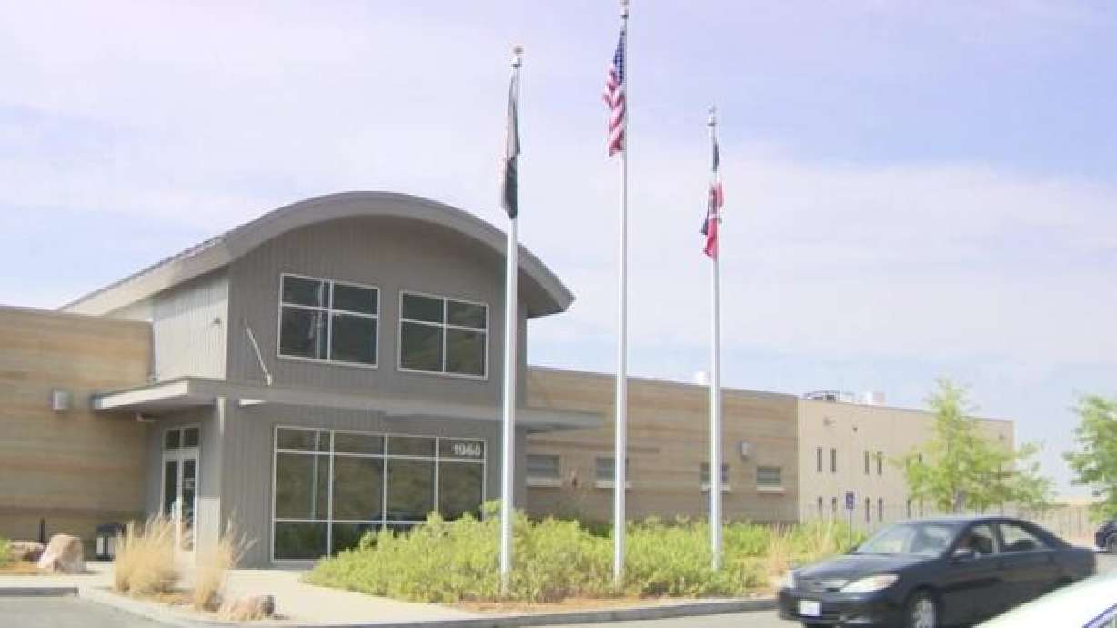 A fight over $50 resulted in three people being arrested Sunday. A woman was charged Tuesday with attempted murder and two others were charged with obstruction of justice.